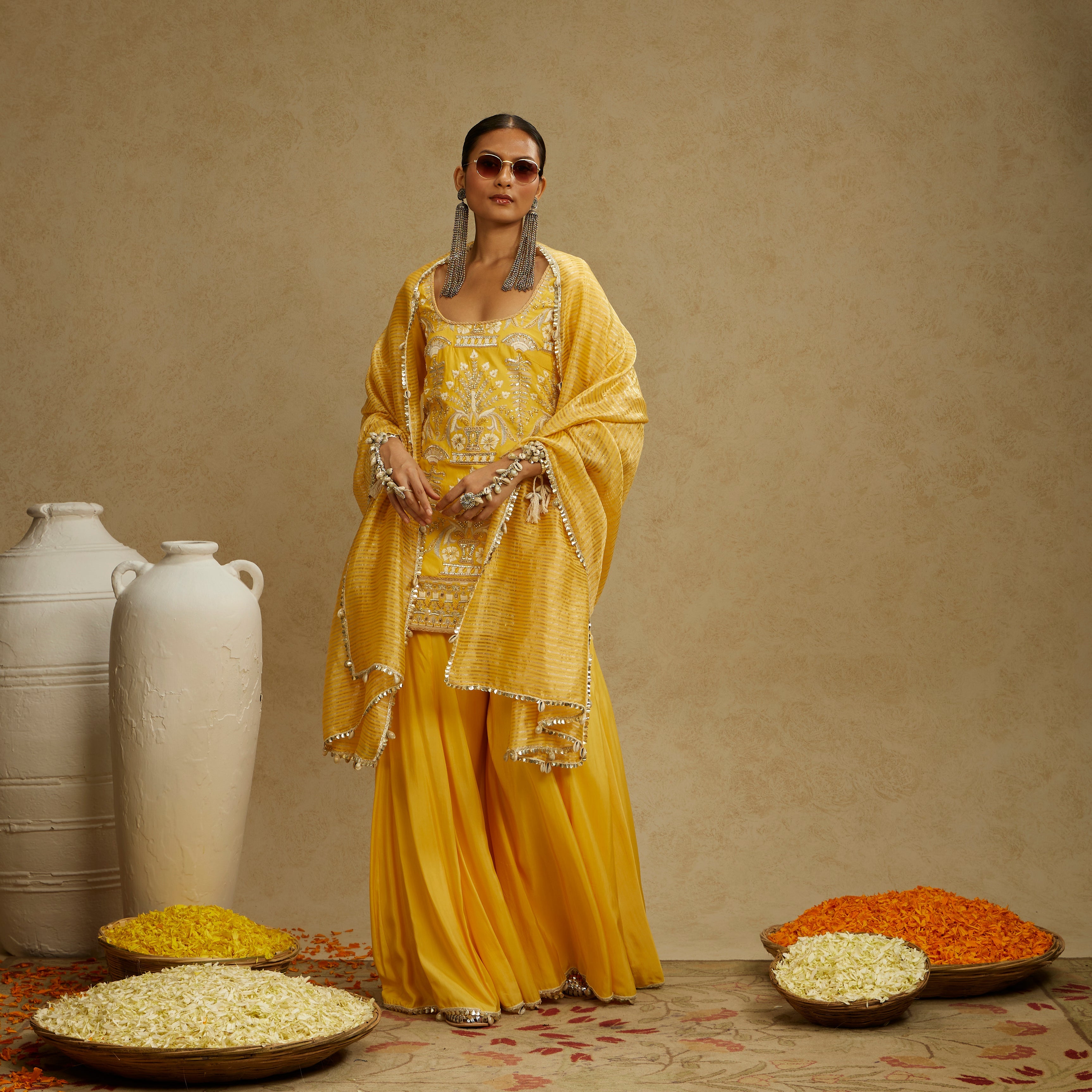 Yellow Embellished Kurta Paired With Sharara And Stripe Dupatta