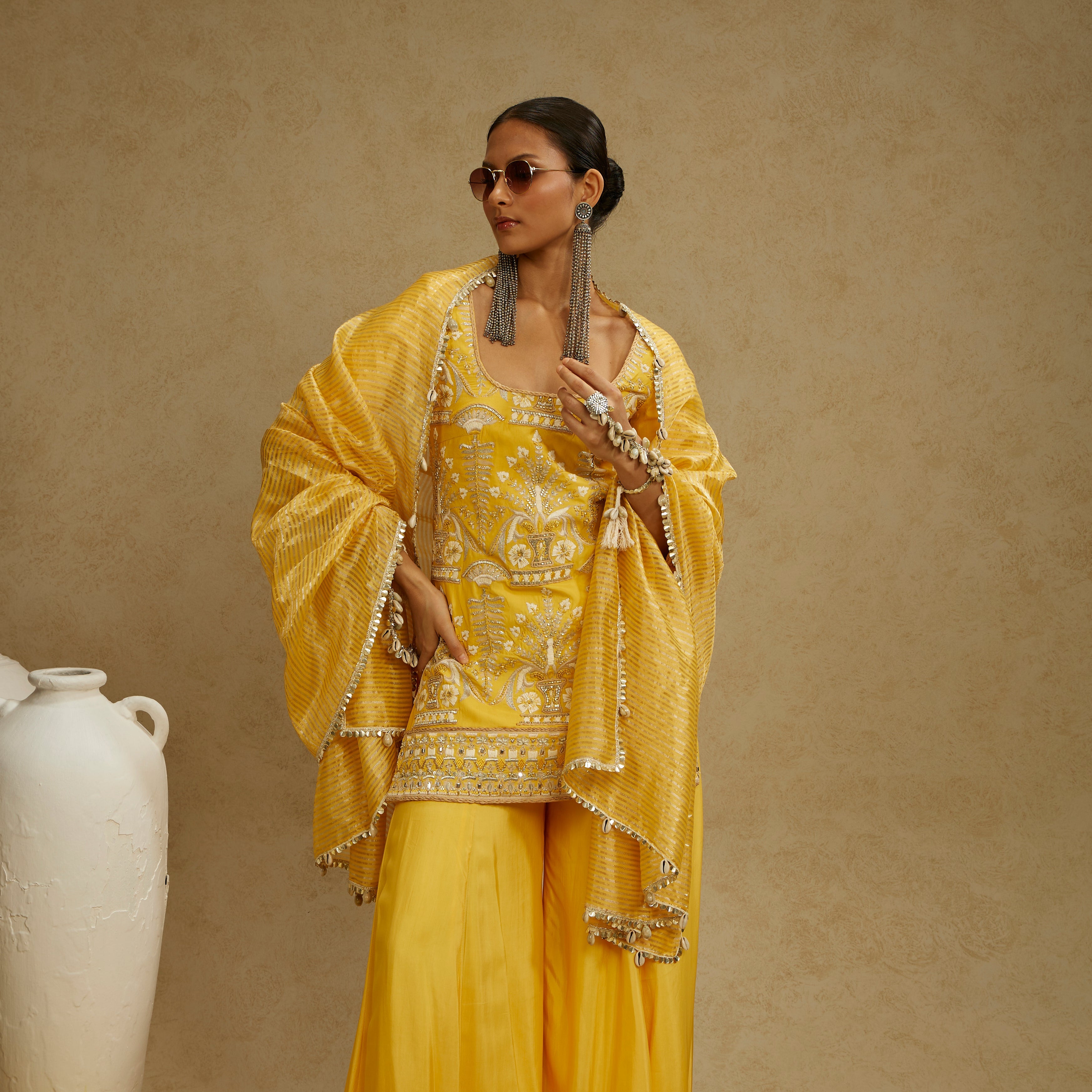 Yellow Embellished Kurta Paired With Sharara And Stripe Dupatta