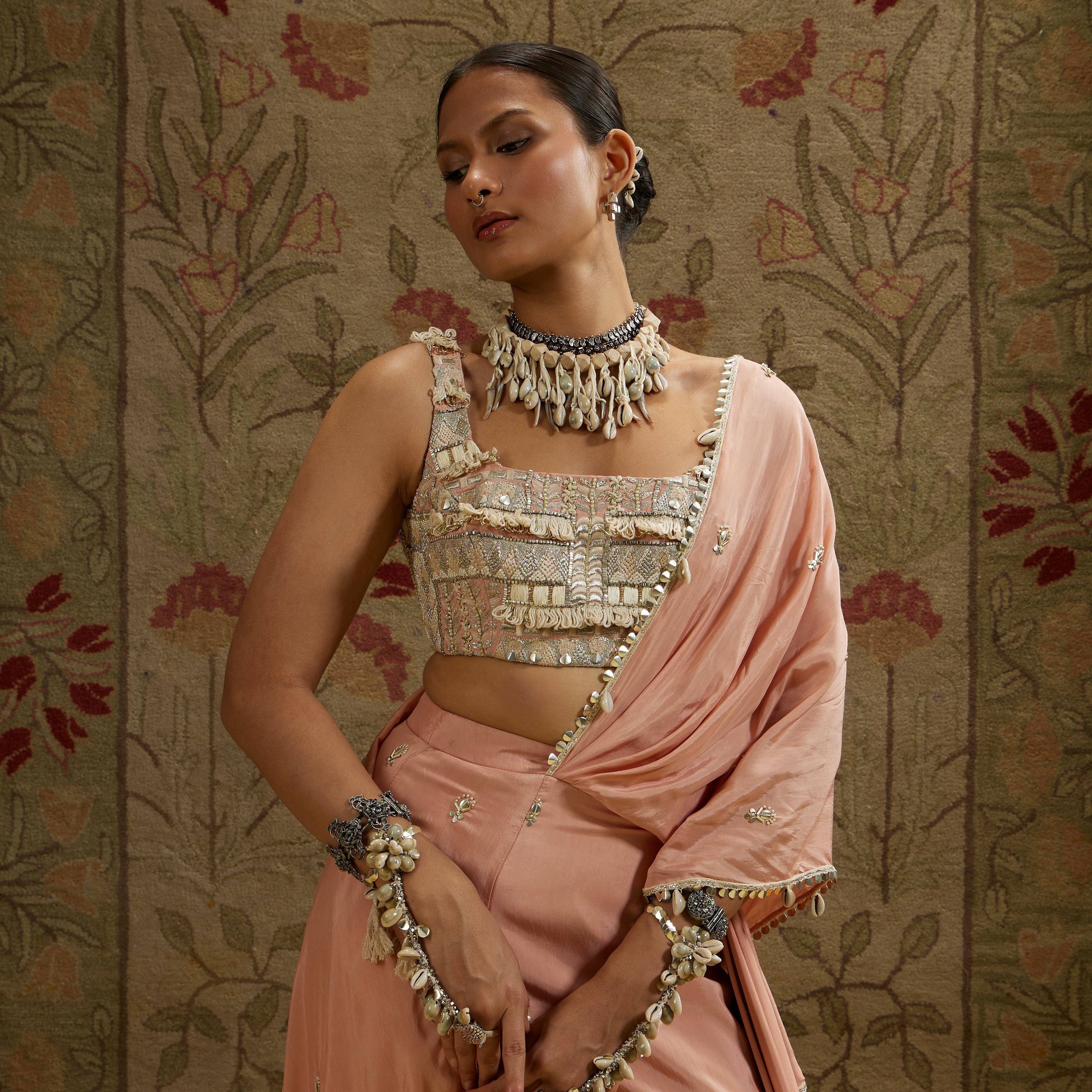 Pink Embellished Saree Paired With Embellished Bustier And Draped Skirt
