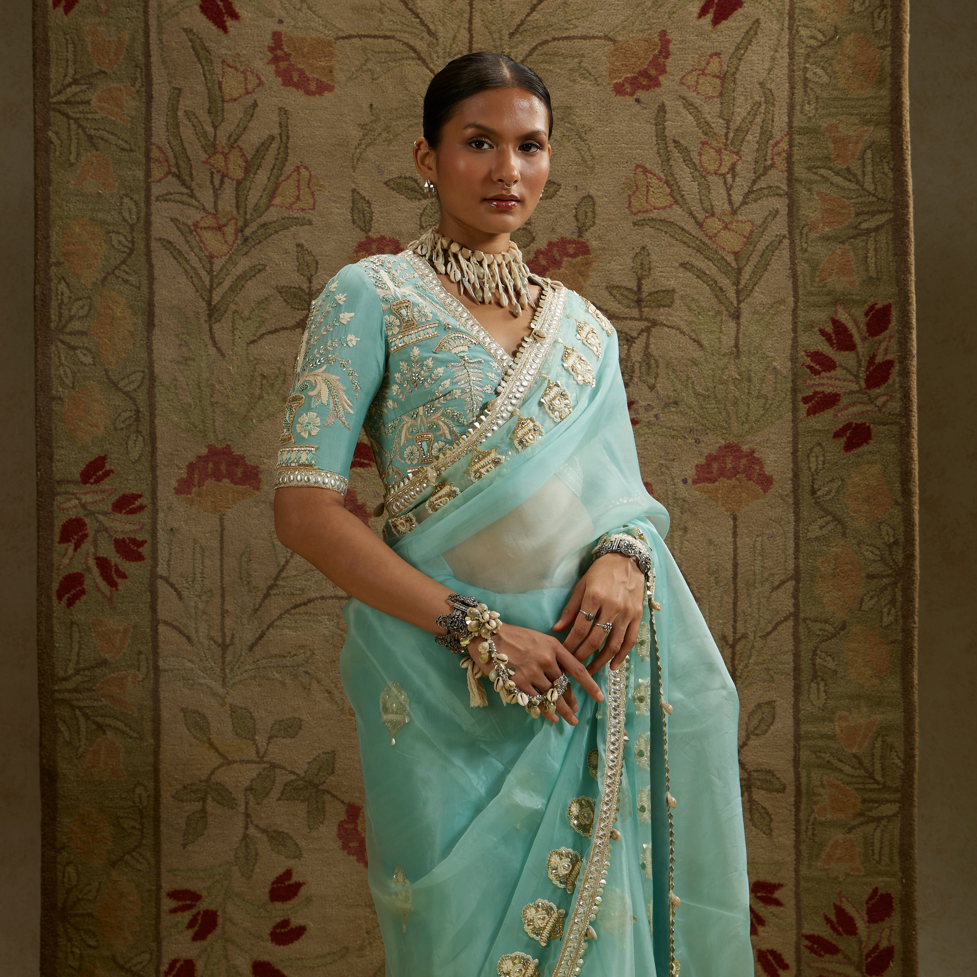 Teal Blue Organza Embellished Saree Paired With Embellished Blouse