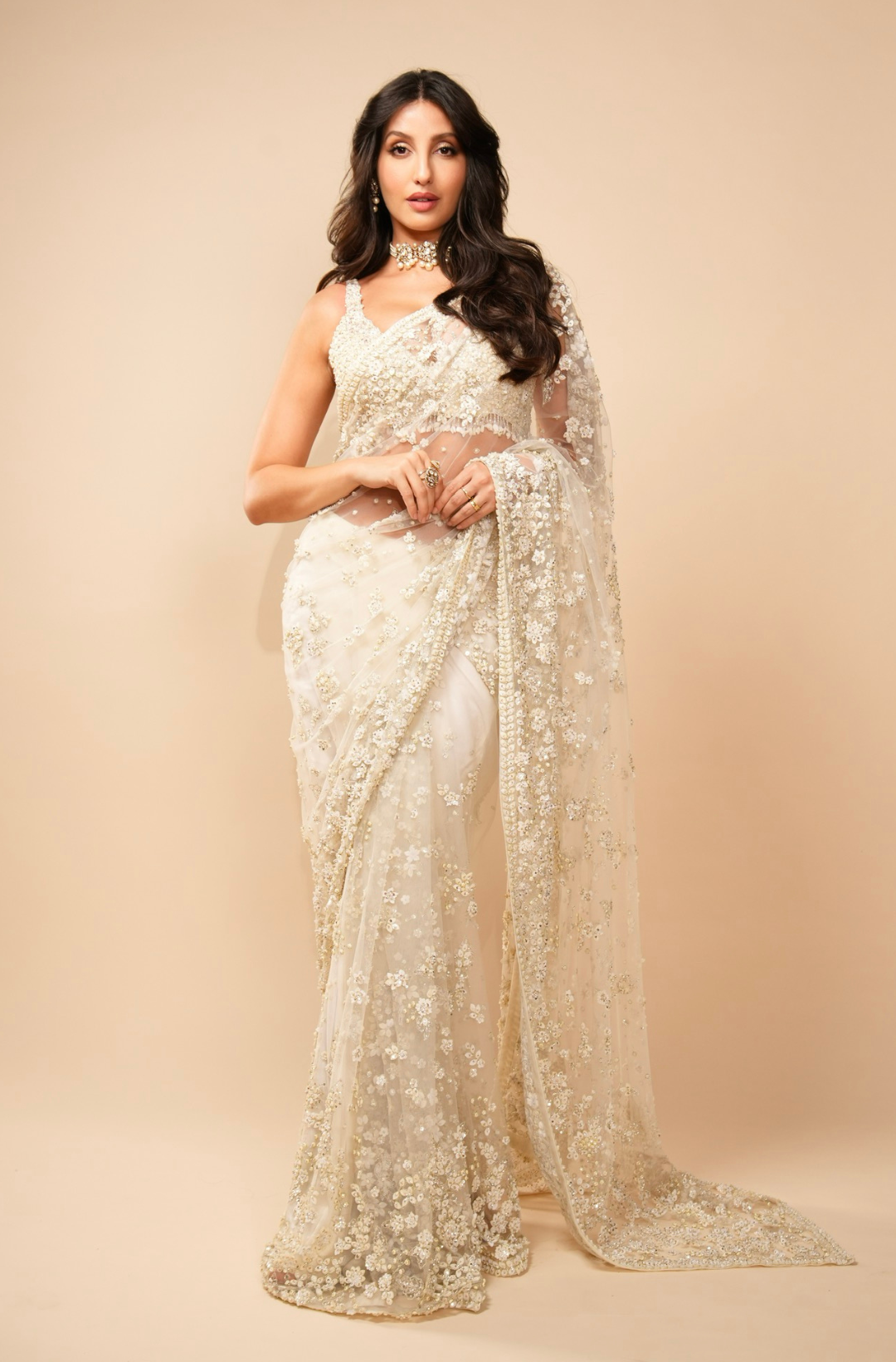 Nora Fatehi In Ivory Three-Dimensional Saree