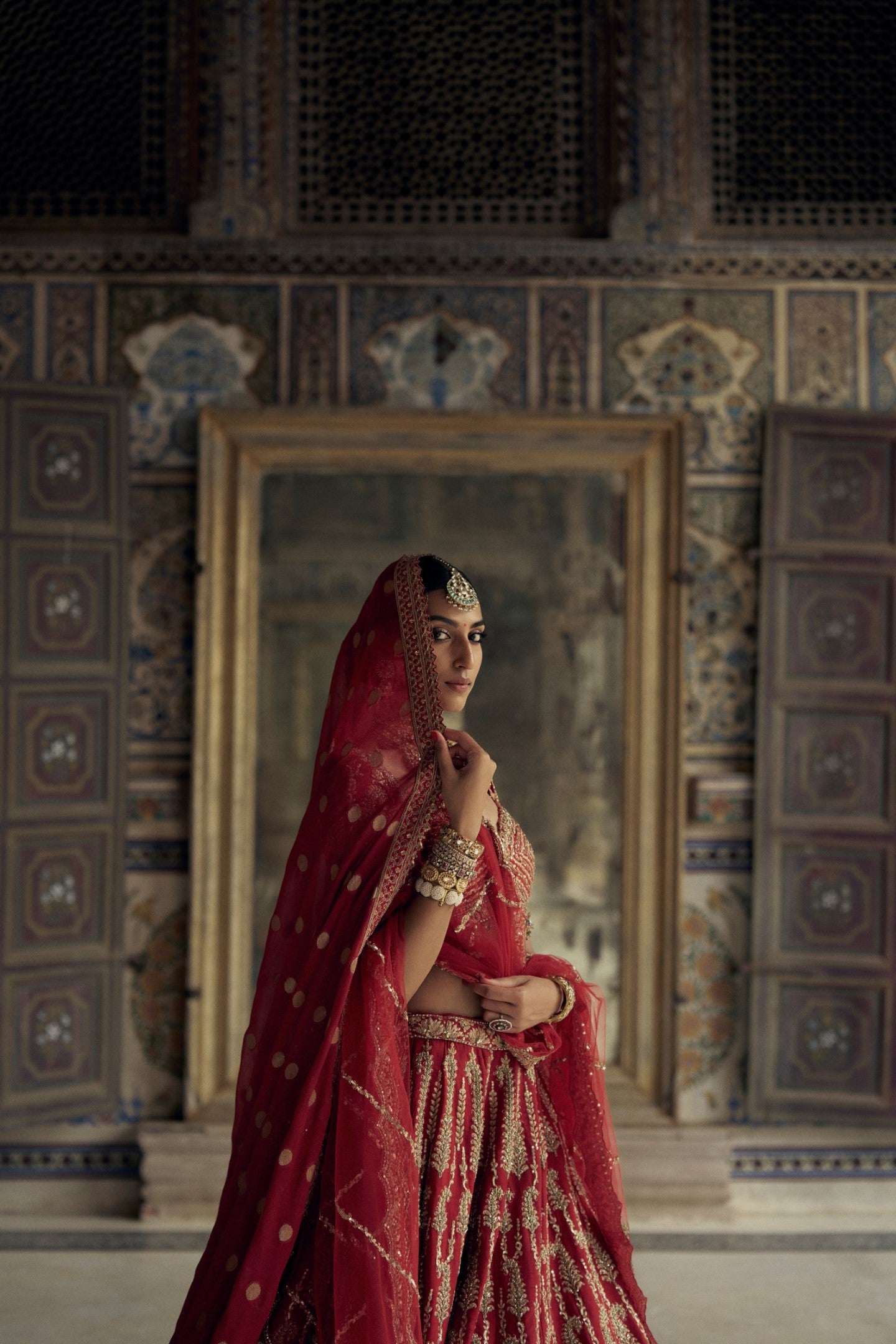 Deep Red Raw Silk Lehenga Choli Set With A Tulle Dupatta