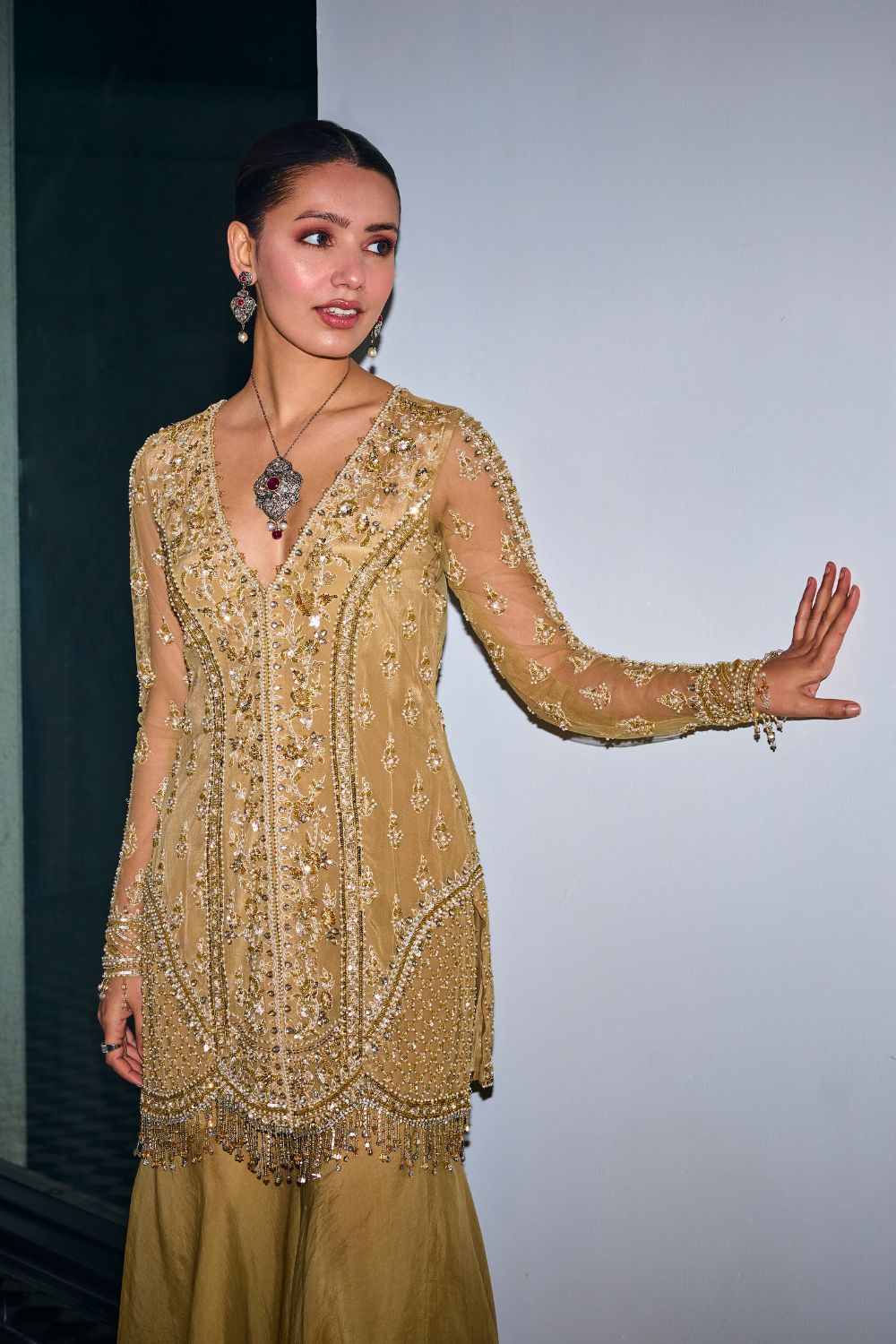 Gold Tonal Embroidered Kurta And Sharara Set