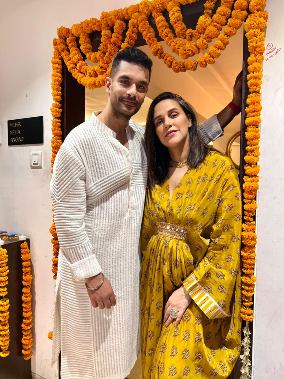 Neha Dhupia In Marigold Buti Kaftan