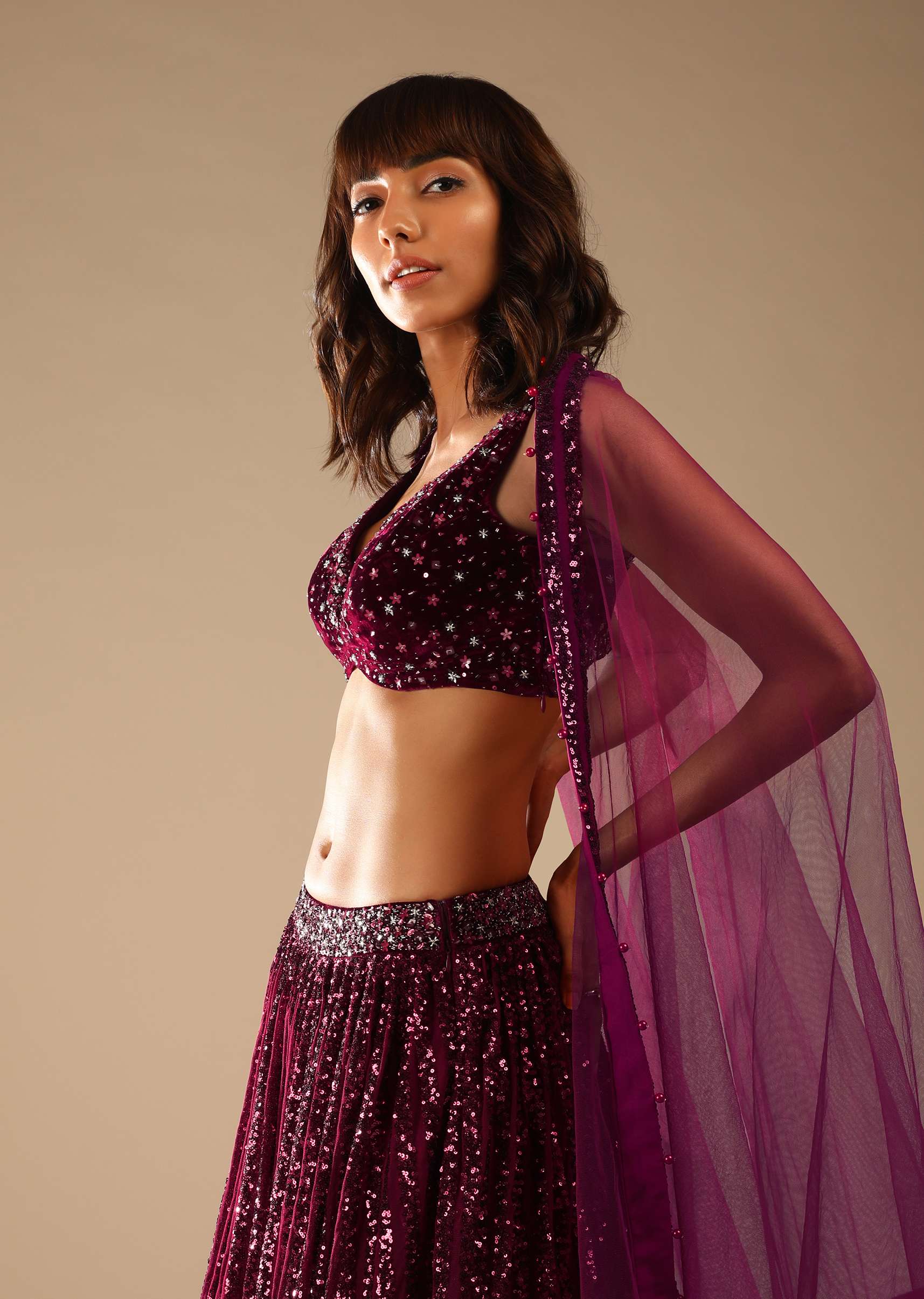 Burgundy Red Lehengaembellished In Sequins With A Velvet Choli Adorned In Flower Shaped Sequins