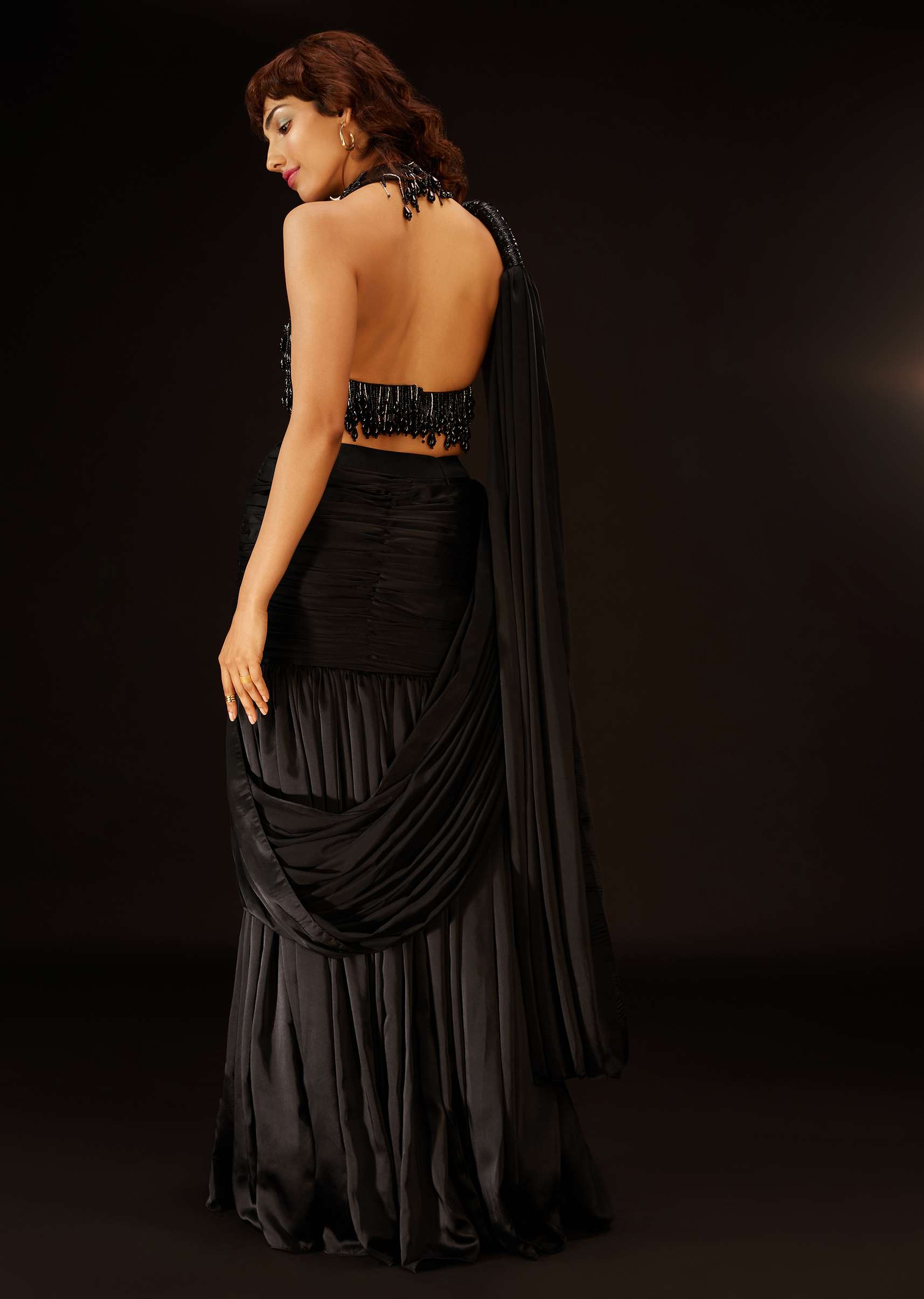 Phantom Black Pre-Pleated Saree In Satin With An Embroidered Halter Blouse - Deme X Kalki
