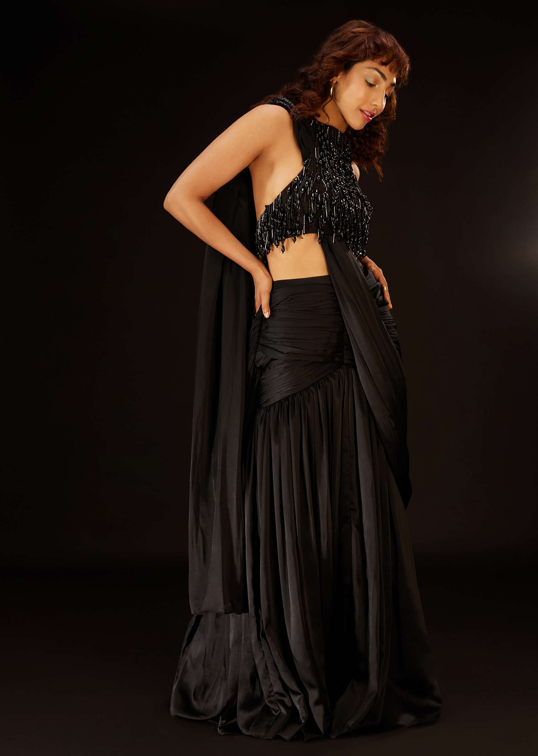 Phantom Black Pre-Pleated Saree In Satin With An Embroidered Halter Blouse - Deme X Kalki