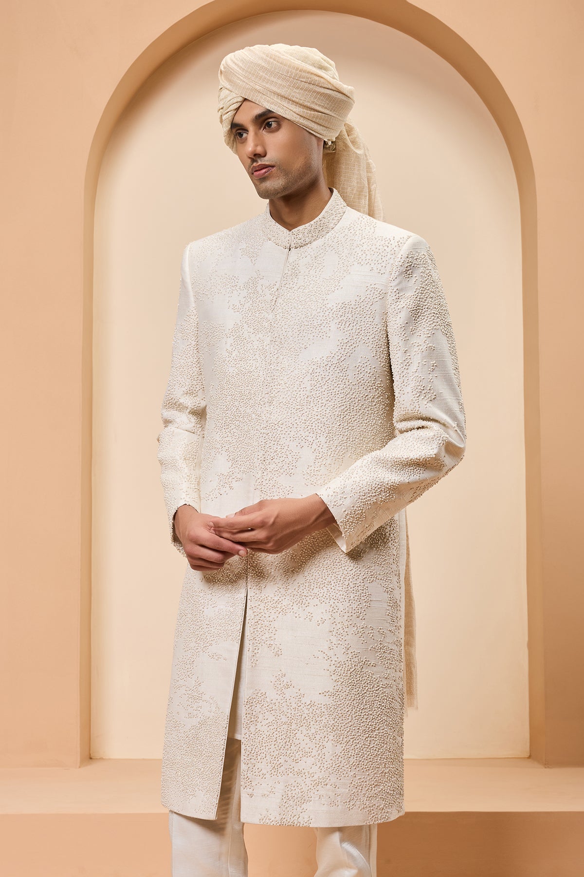 Ivory Sherwani Detailing With Pearl Cutdana And Thread Work