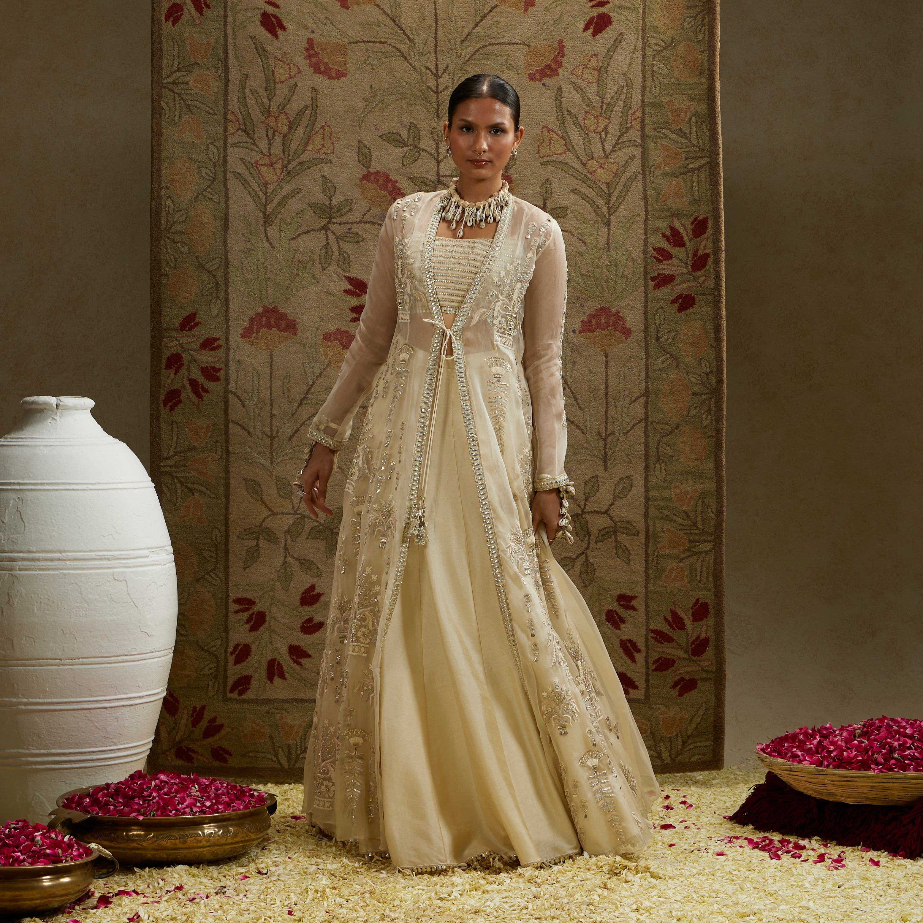Magnolia Organza Embellished Jacket Paired With Metal Bustier And Lehenga