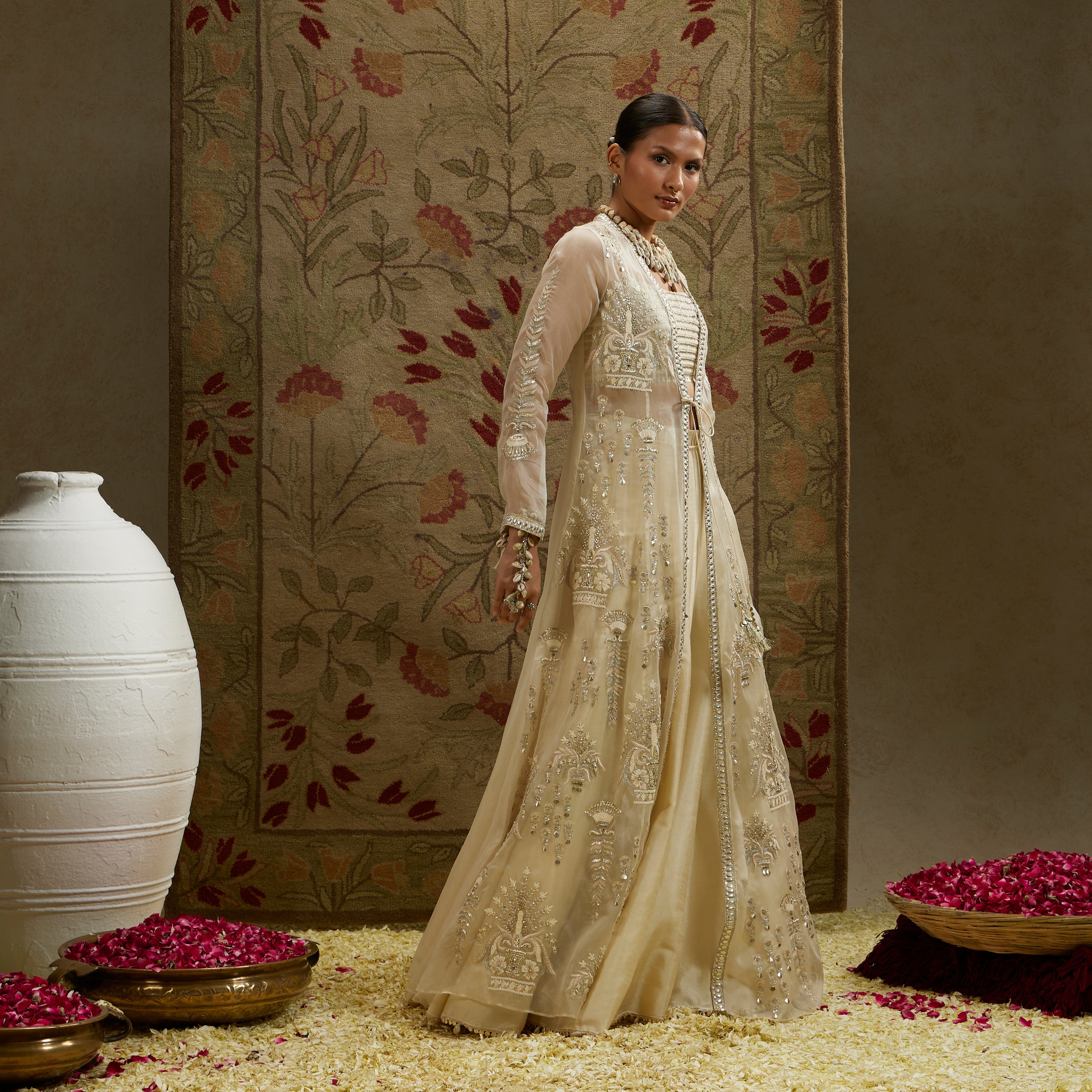 Magnolia Organza Embellished Jacket Paired With Metal Bustier And Lehenga
