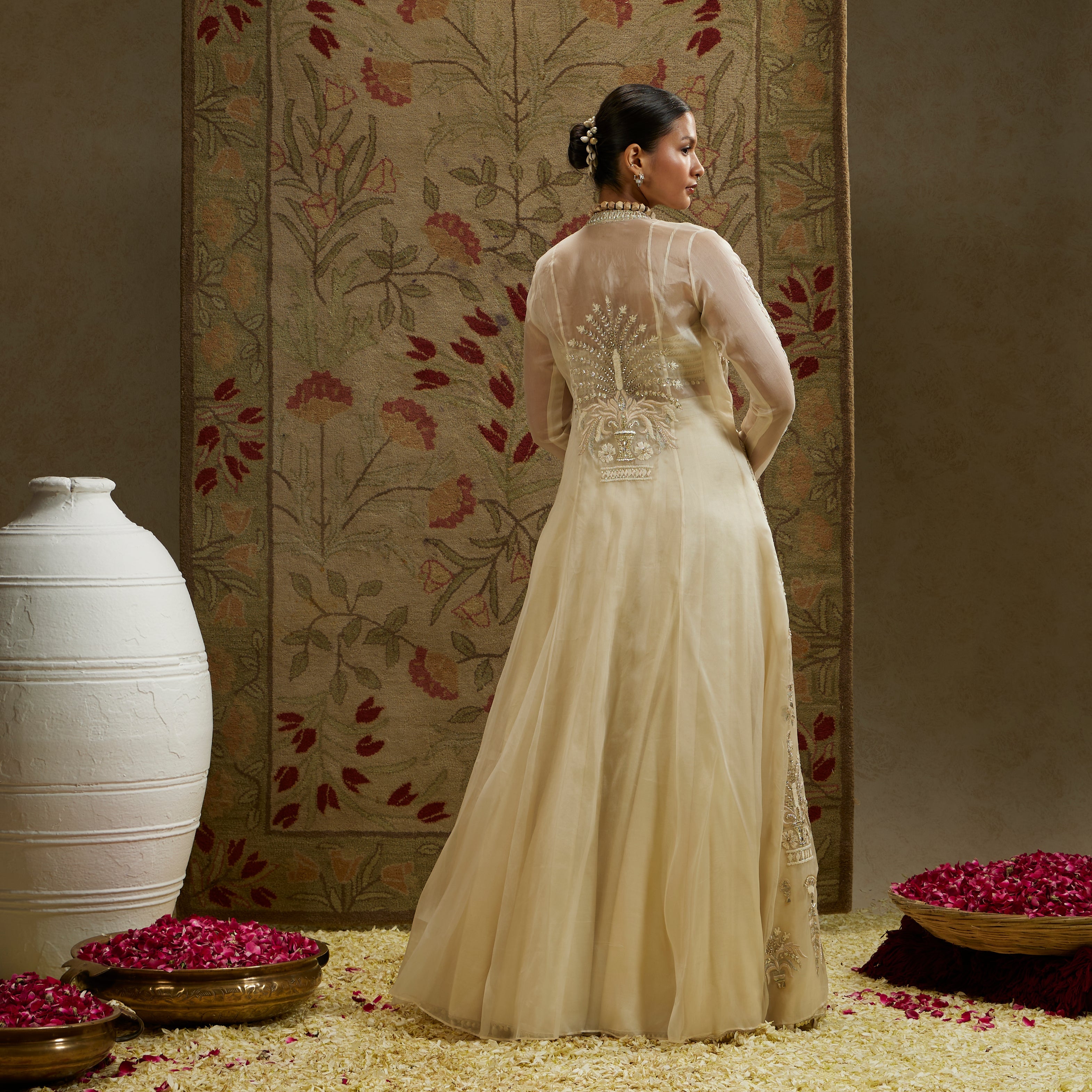Magnolia Organza Embellished Jacket Paired With Metal Bustier And Lehenga