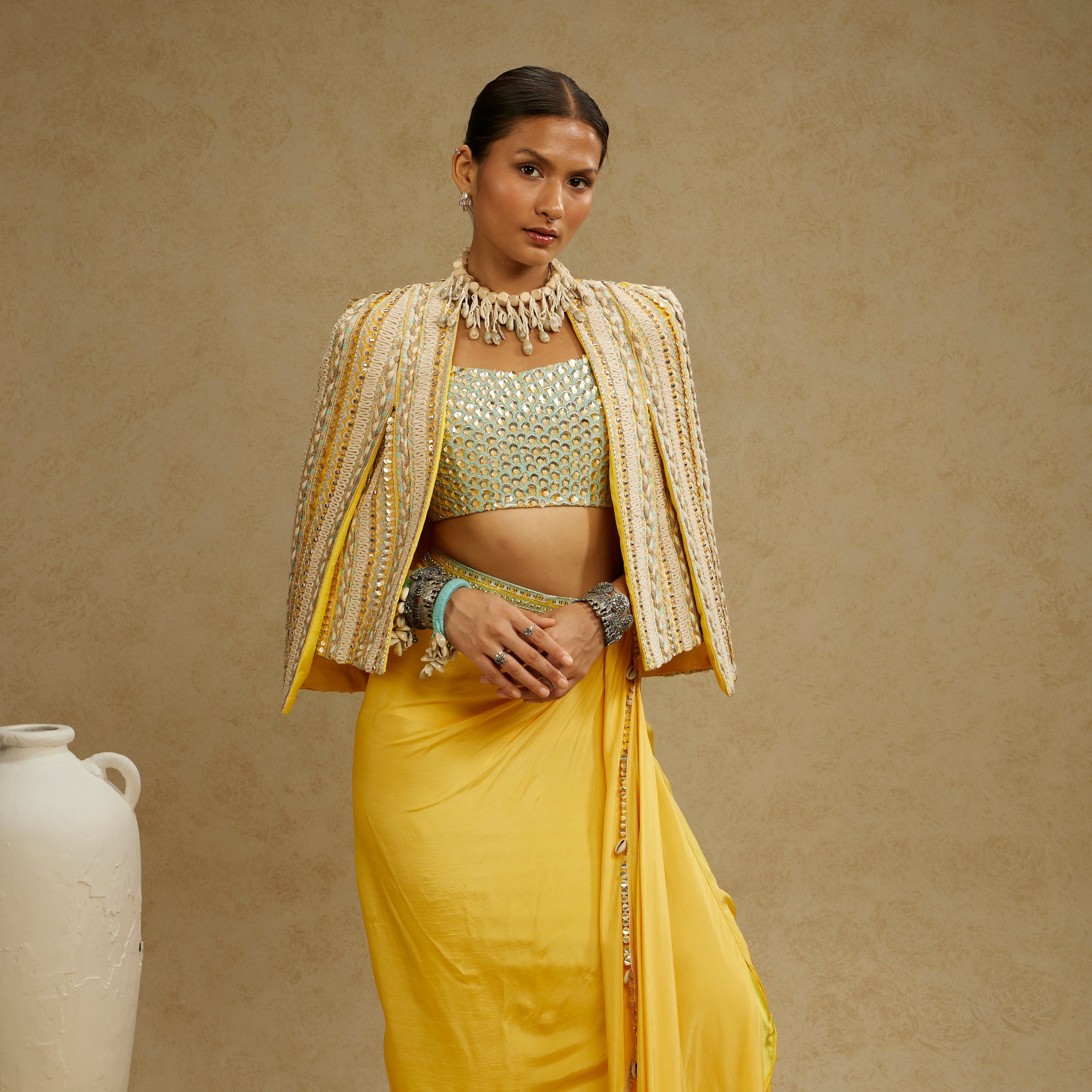 Dandelion Embellished Jacket Paired With Embellished Bustier And High Slit Skirt