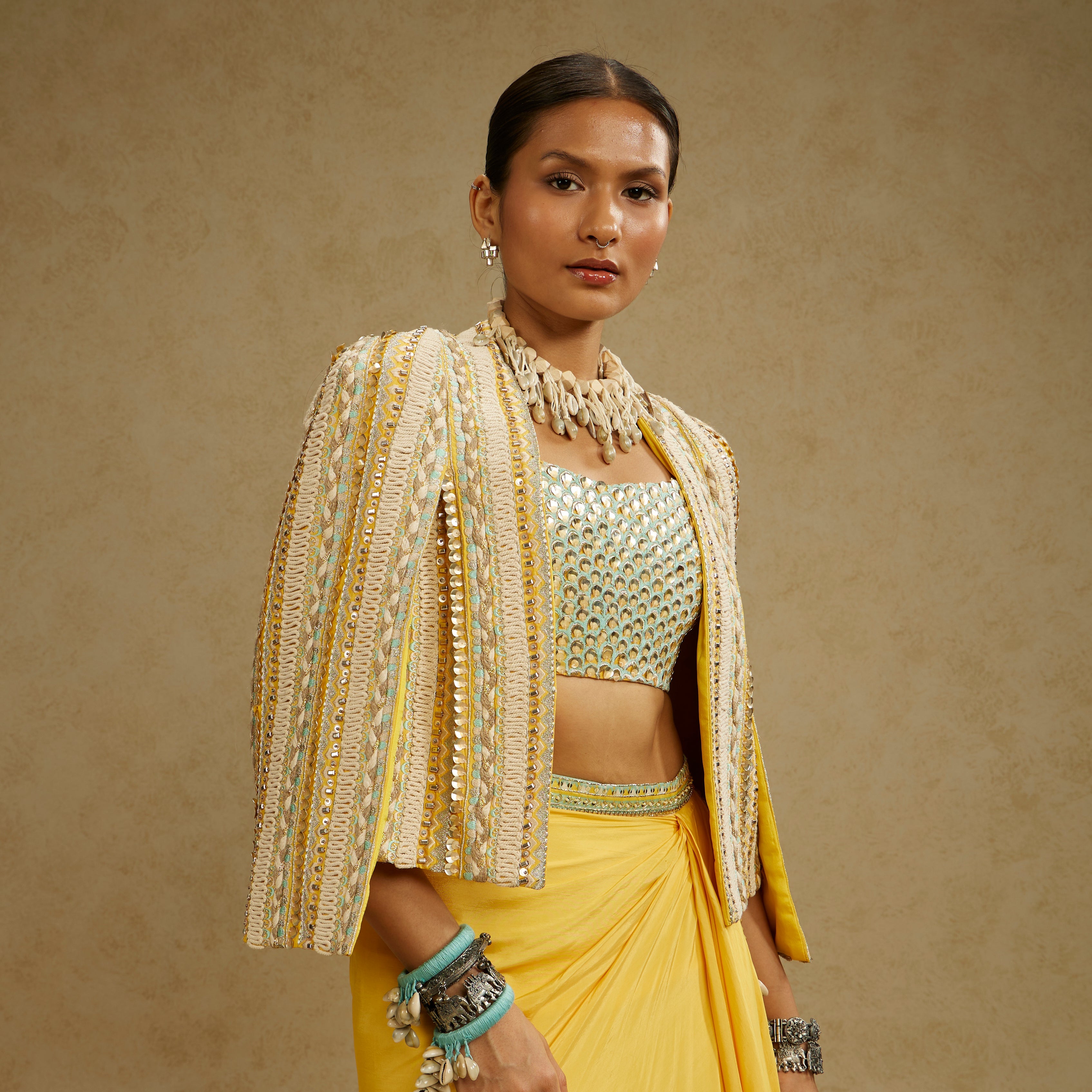 Dandelion Embellished Jacket Paired With Embellished Bustier And High Slit Skirt