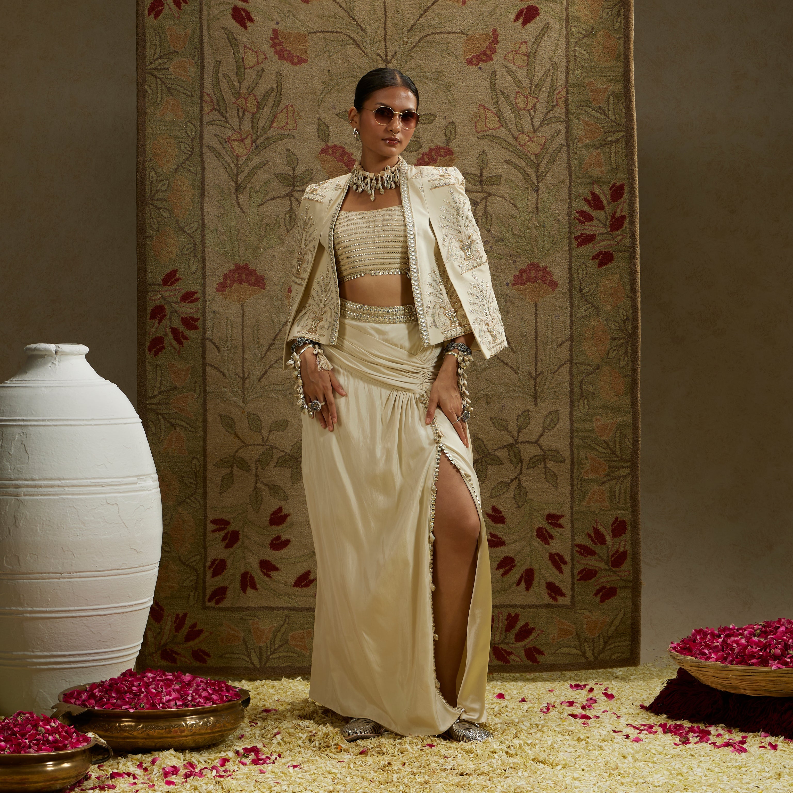 Magnolia Embellished Butta Cape Jacket Paired With Metal Embellished Bustier And Slit Skirt