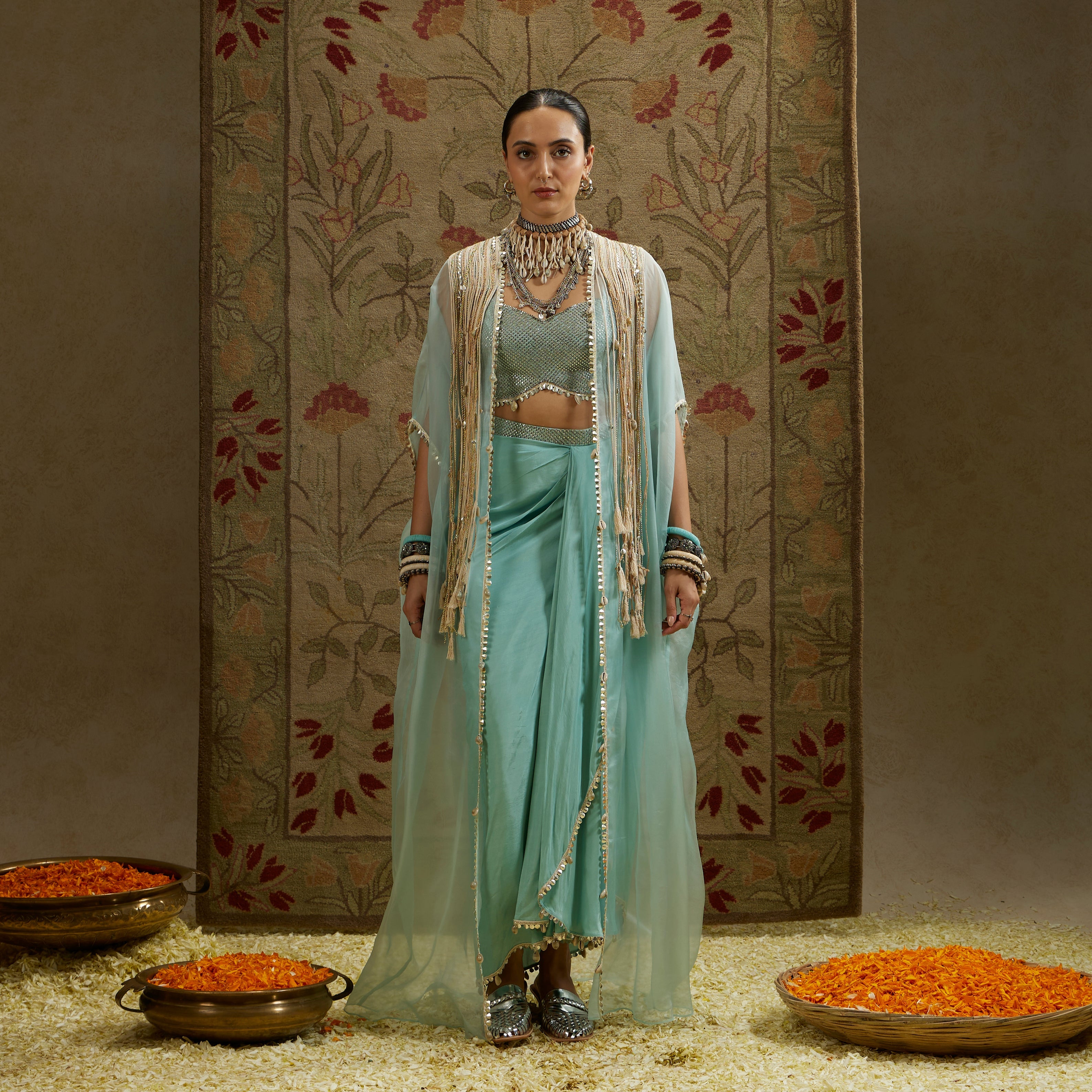 Teal Blue Thread Tassle Cape Paired With Metal Embellished Bustier And Drape Skirt