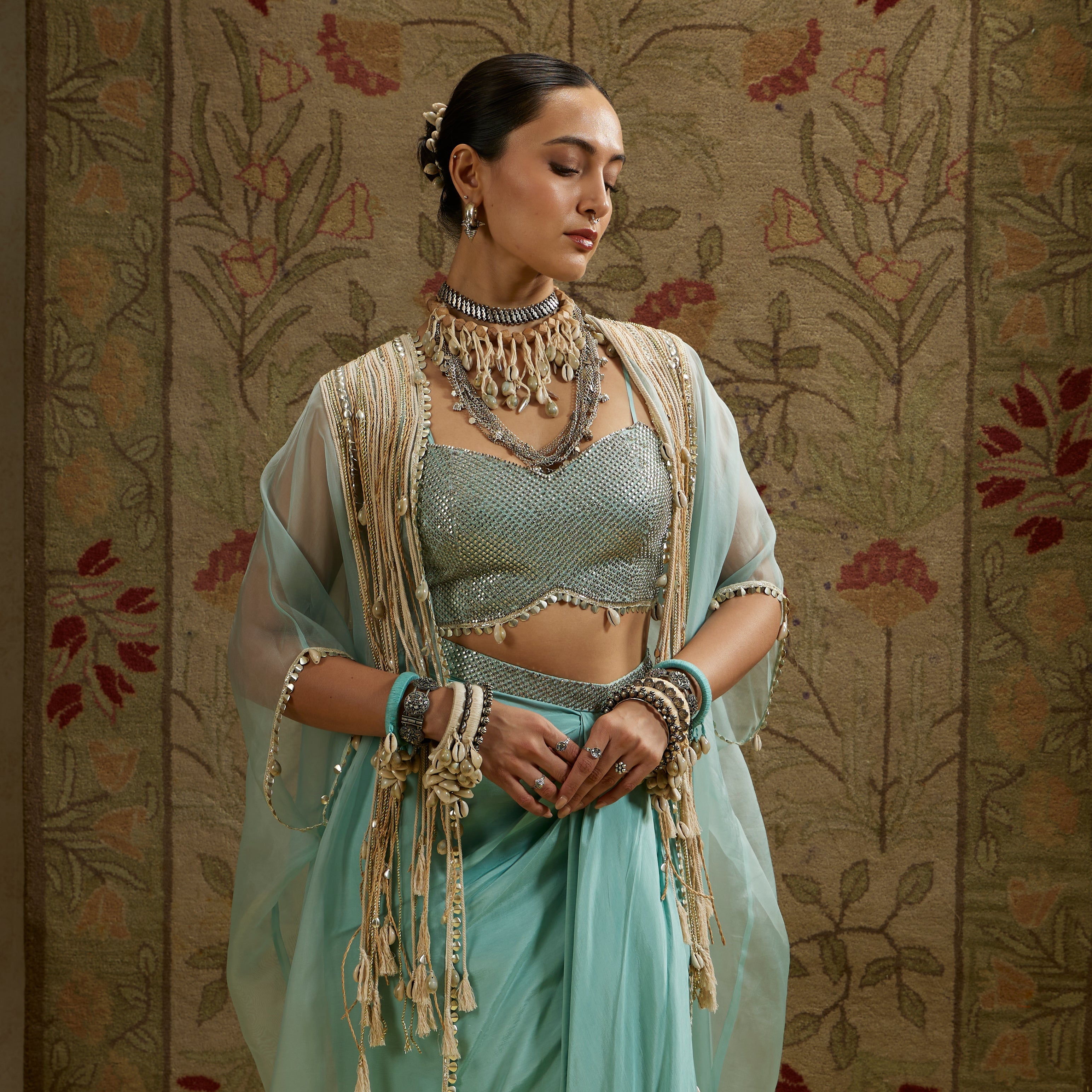 Teal Blue Thread Tassle Cape Paired With Metal Embellished Bustier And Drape Skirt