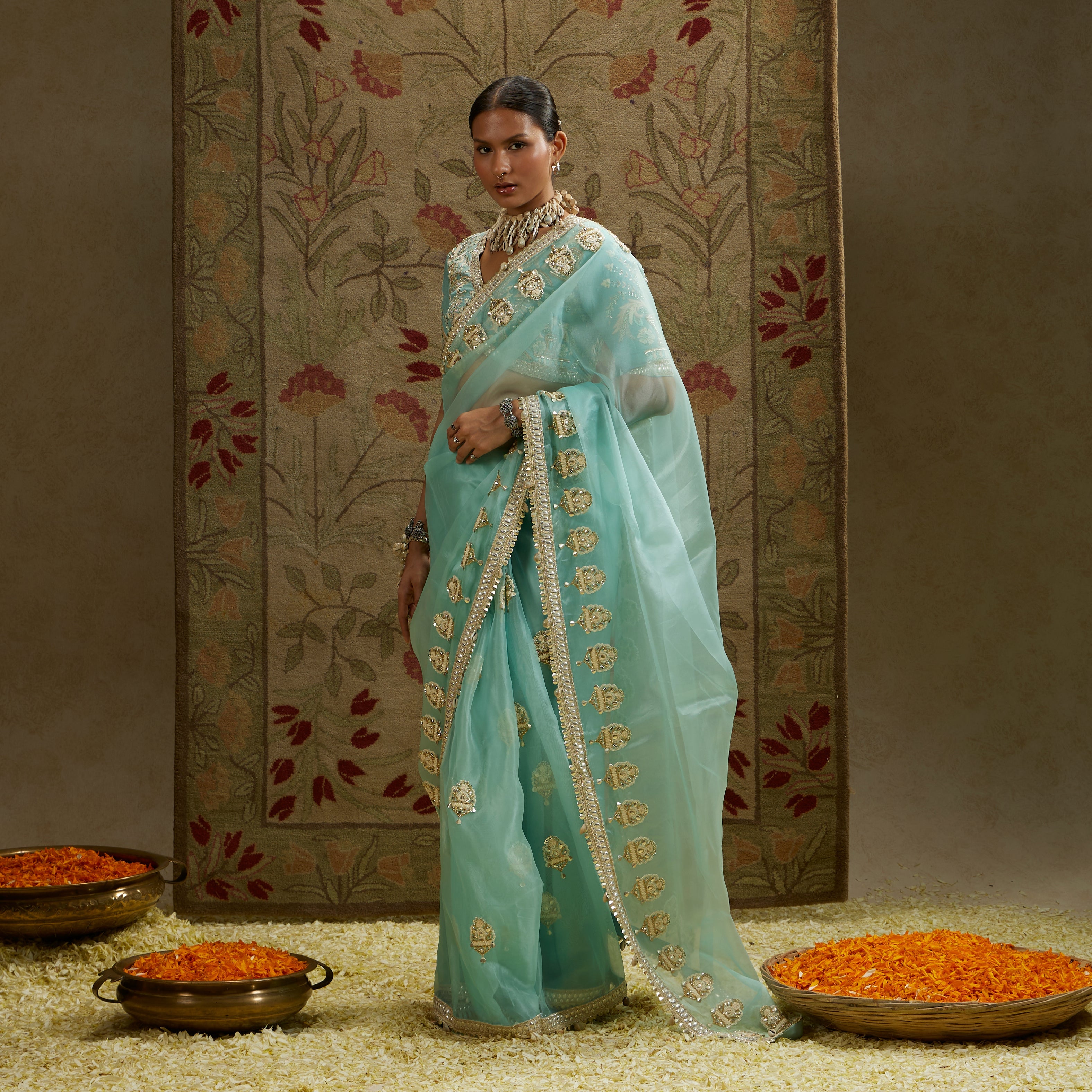 Teal Blue Organza Embellished Saree Paired With Embellished Blouse