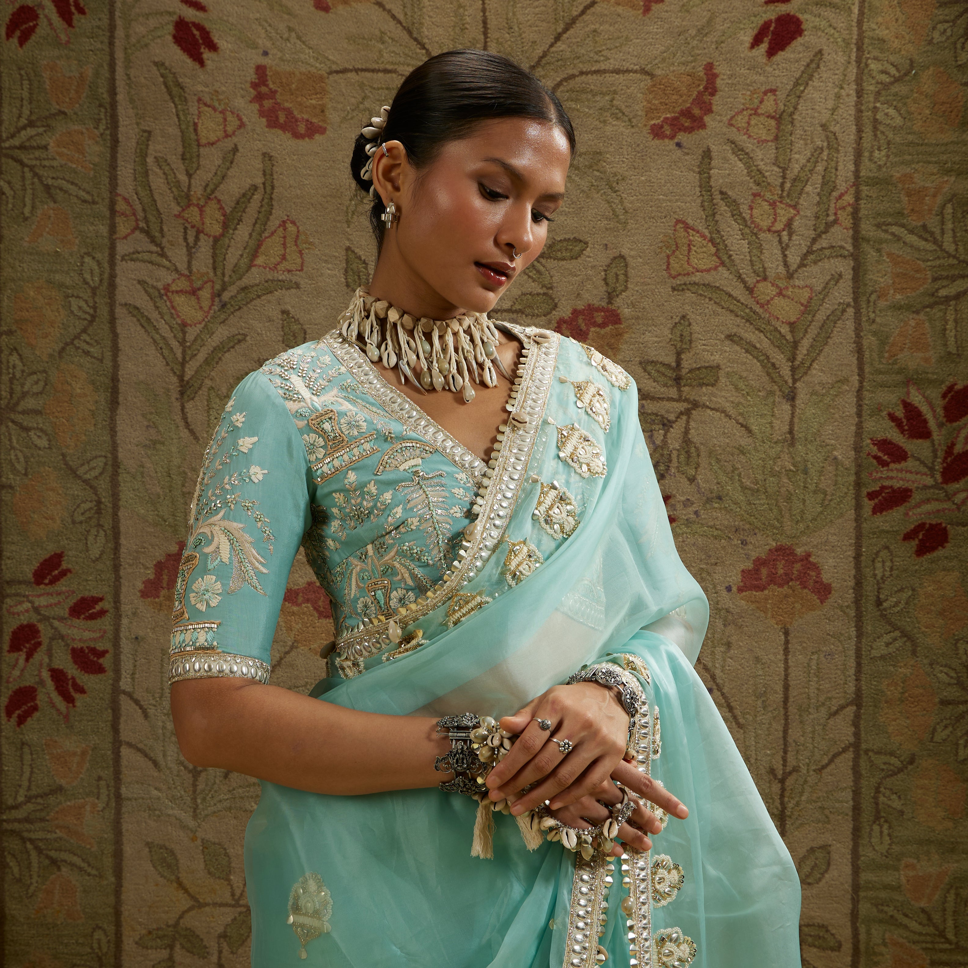 Teal Blue Organza Embellished Saree Paired With Embellished Blouse