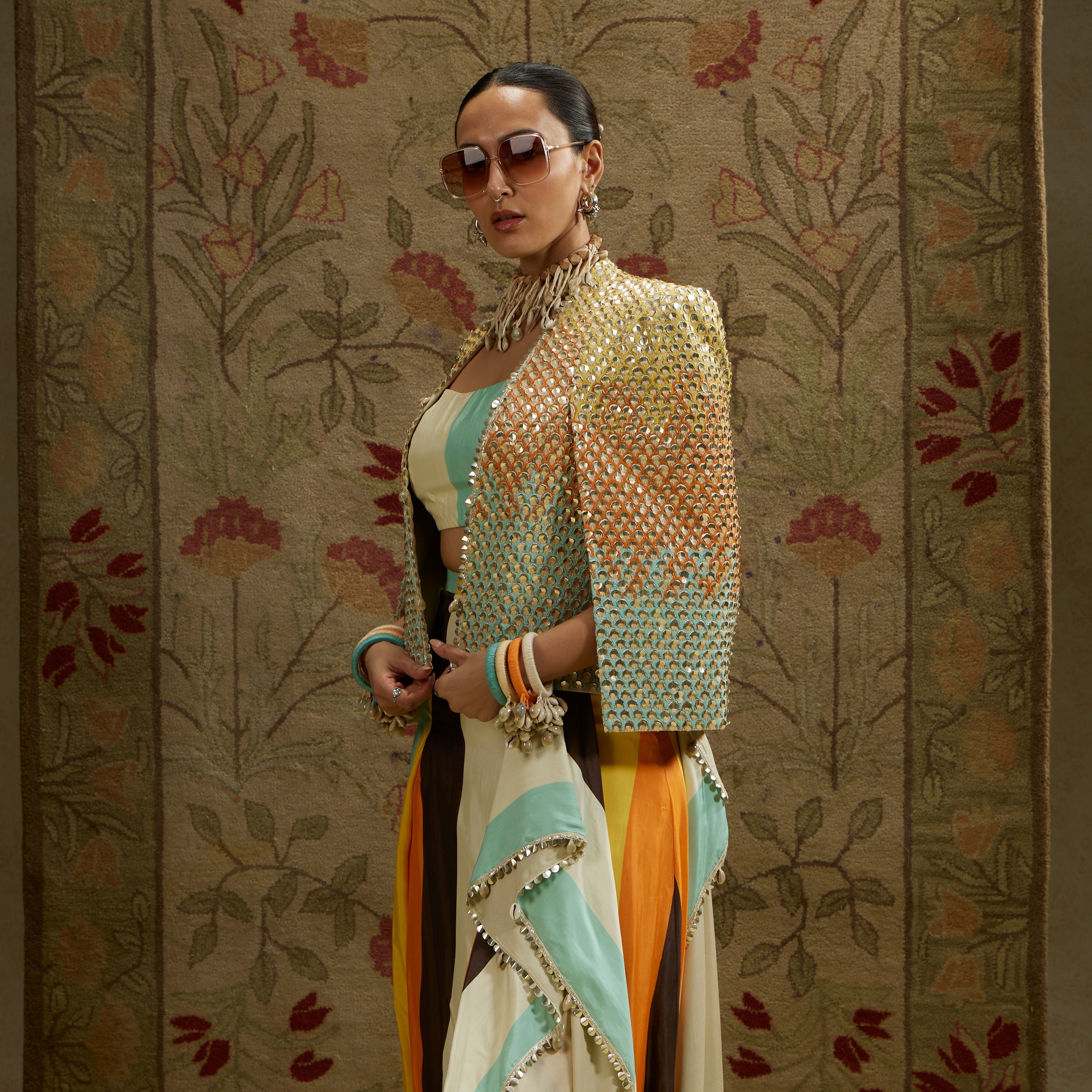 Multi Colored Metallic Noor Jacket Paired With Stripe Printed Bustier And Skirt