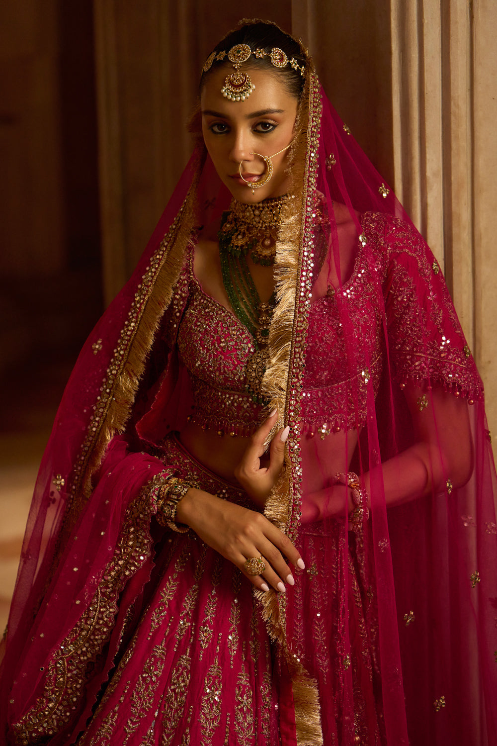 Fuchsia Red Raw Silk Bridal Lehenga Choli With A Tulle Dupatta And An Optional Second Tulle Dupatta