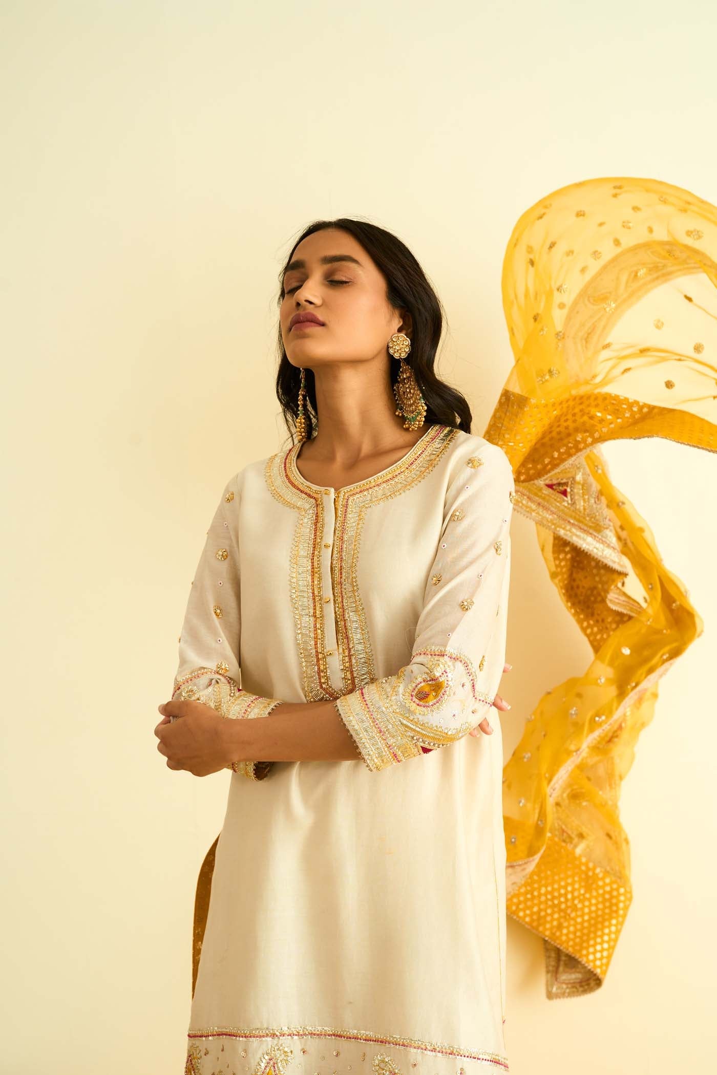 Shraddha Gurung In Shafna Daisy Ivory Short Kurta With Garara And Dupatta
