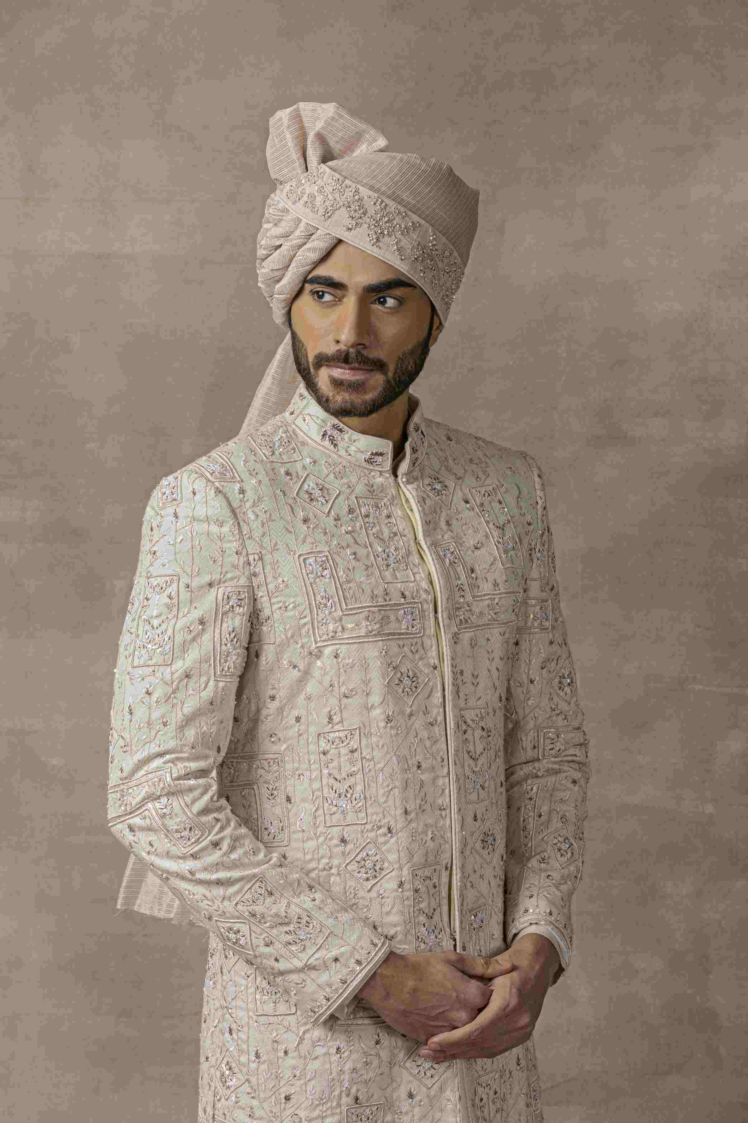 Ivory Sherwani With Pink Embroidery Highlighted With Sequin