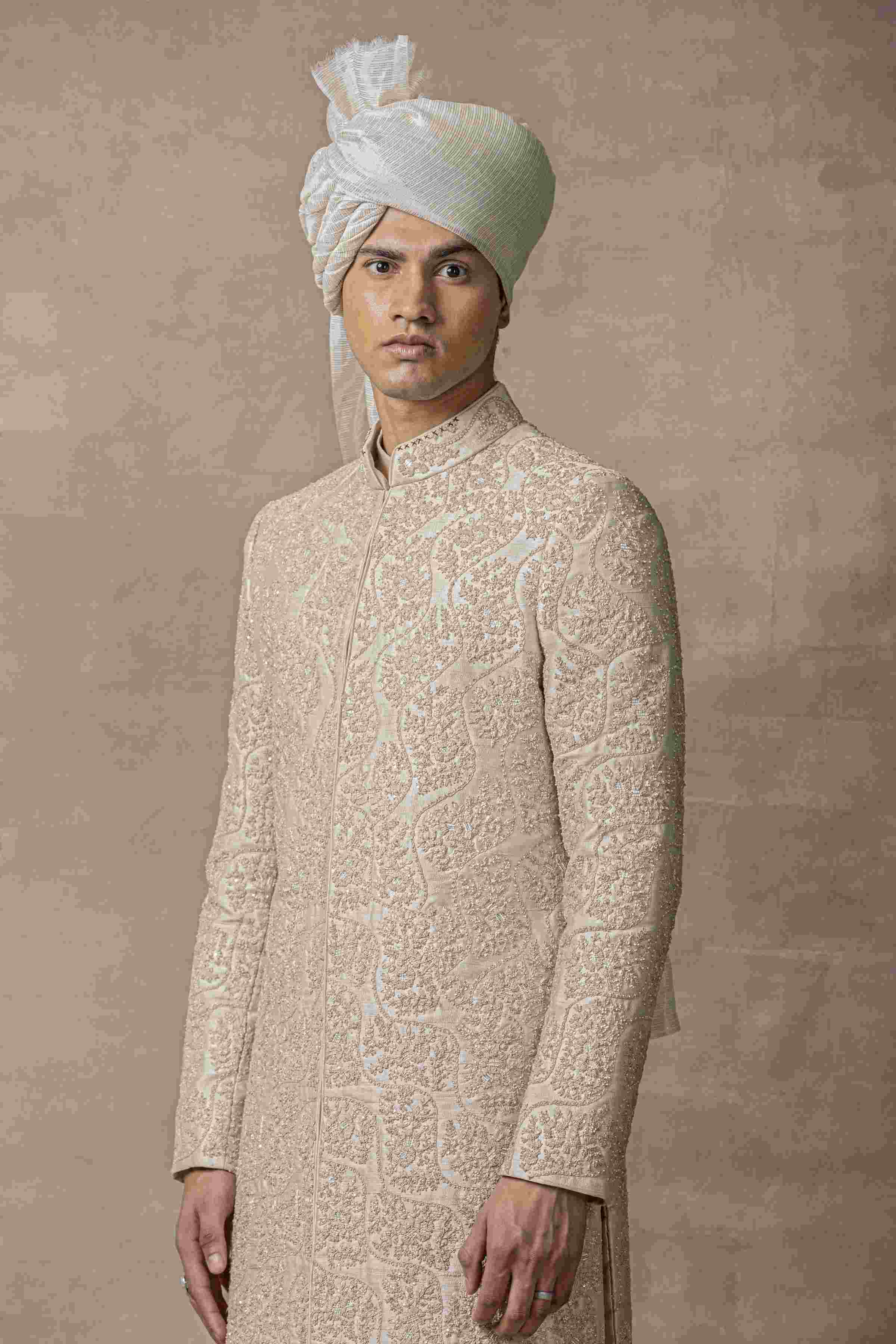 Rose Gold Sherwani Highlighted With Rose Gold Zari And Thread