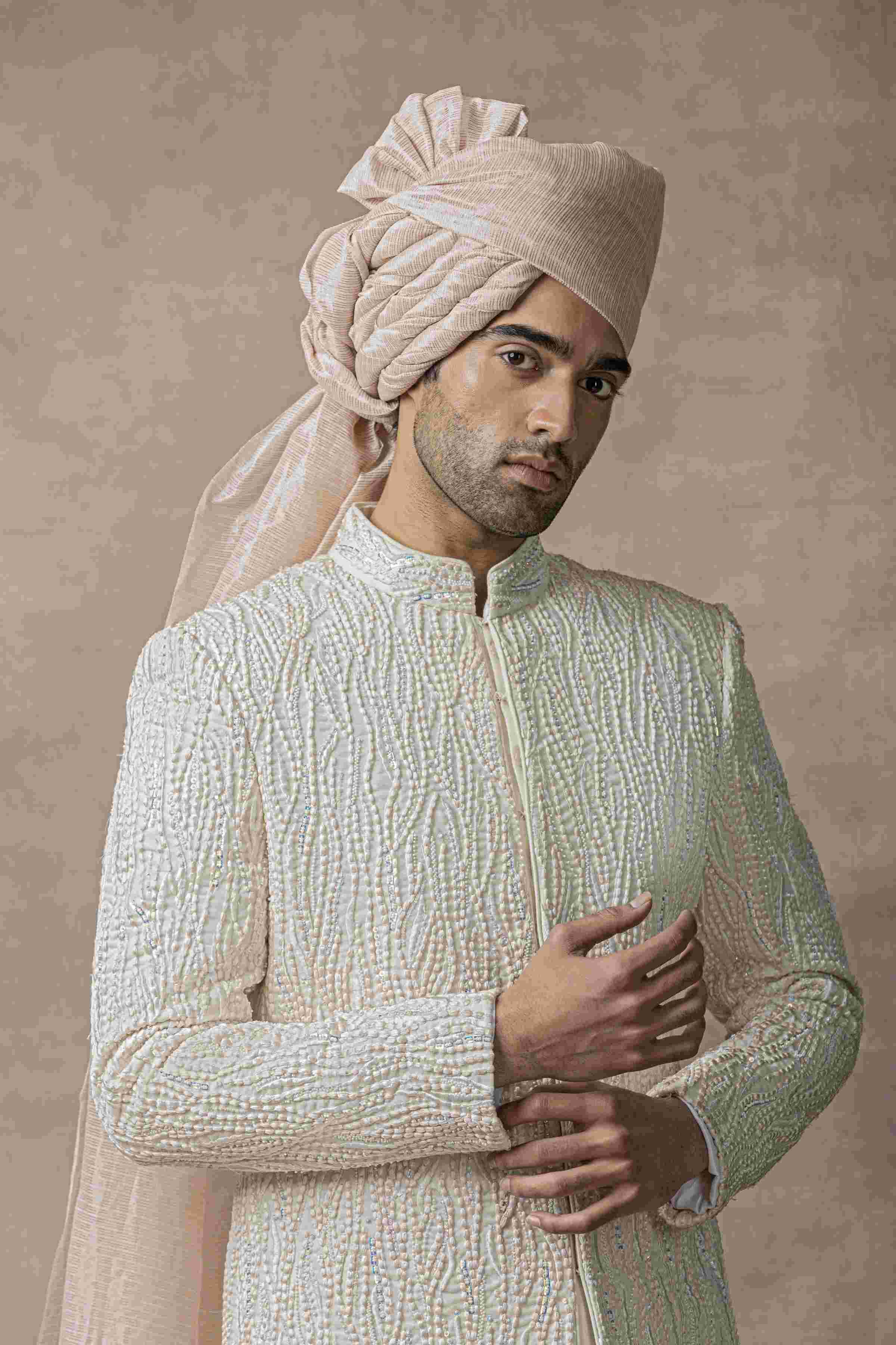 Off White Sherwani Highlighted With Thread Pearl And Multi Coloured Sequin