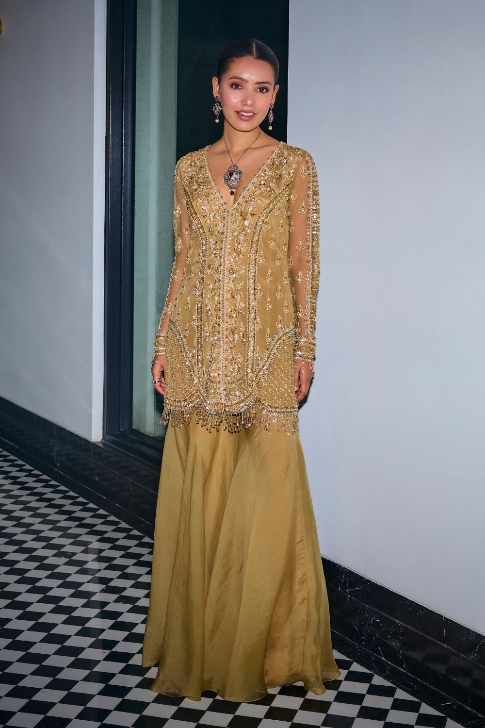 Gold Tonal Embroidered Kurta And Sharara Set