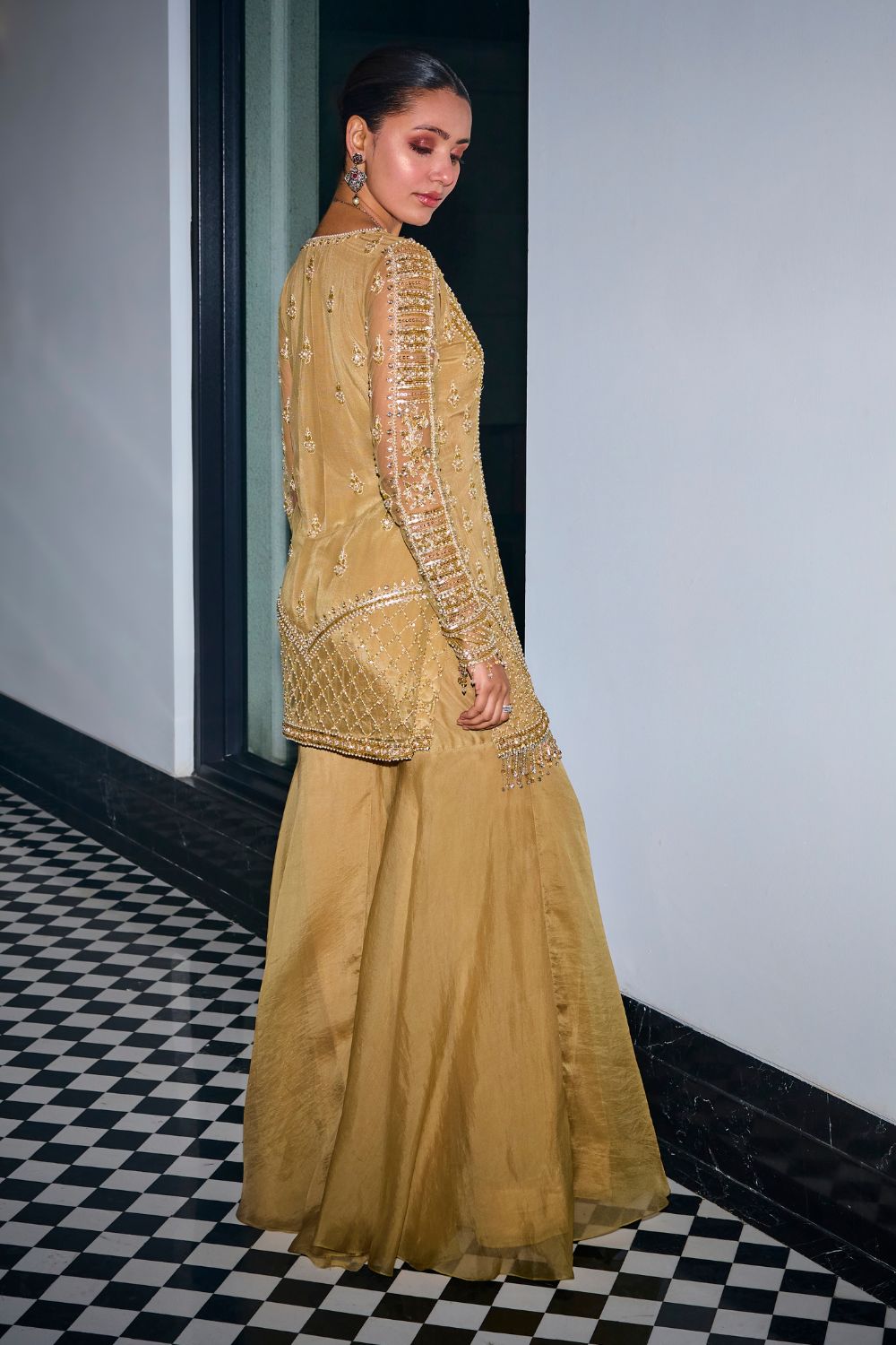 Gold Tonal Embroidered Kurta And Sharara Set