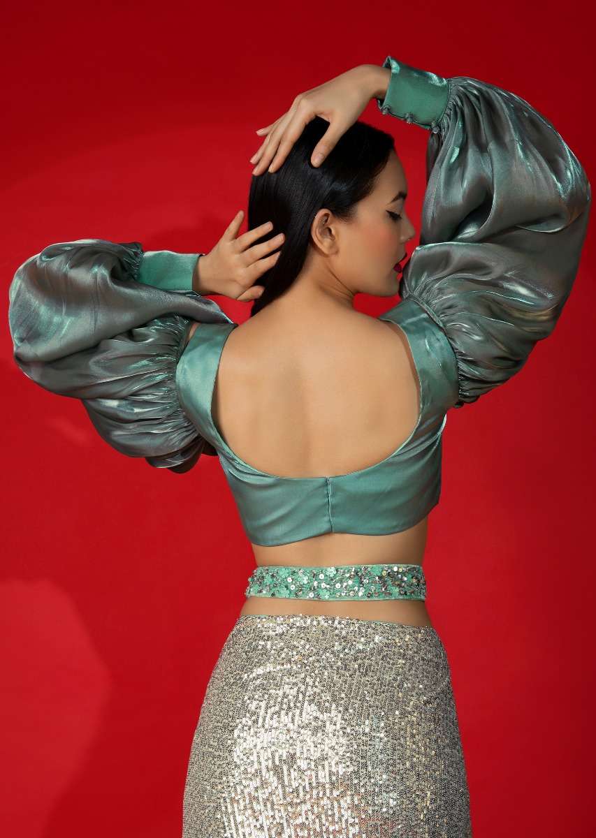 Aqua Green Ombre Ready Pleated Saree Embellished In Sequins With A Aqua And Grey Organza Blouse With Elaborate Balloon Sleeves