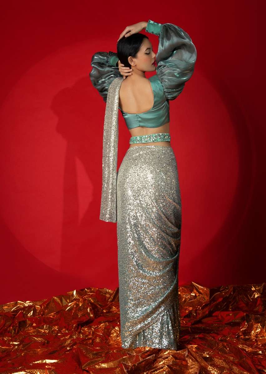 Aqua Green Ombre Ready Pleated Saree Embellished In Sequins With A Aqua And Grey Organza Blouse With Elaborate Balloon Sleeves