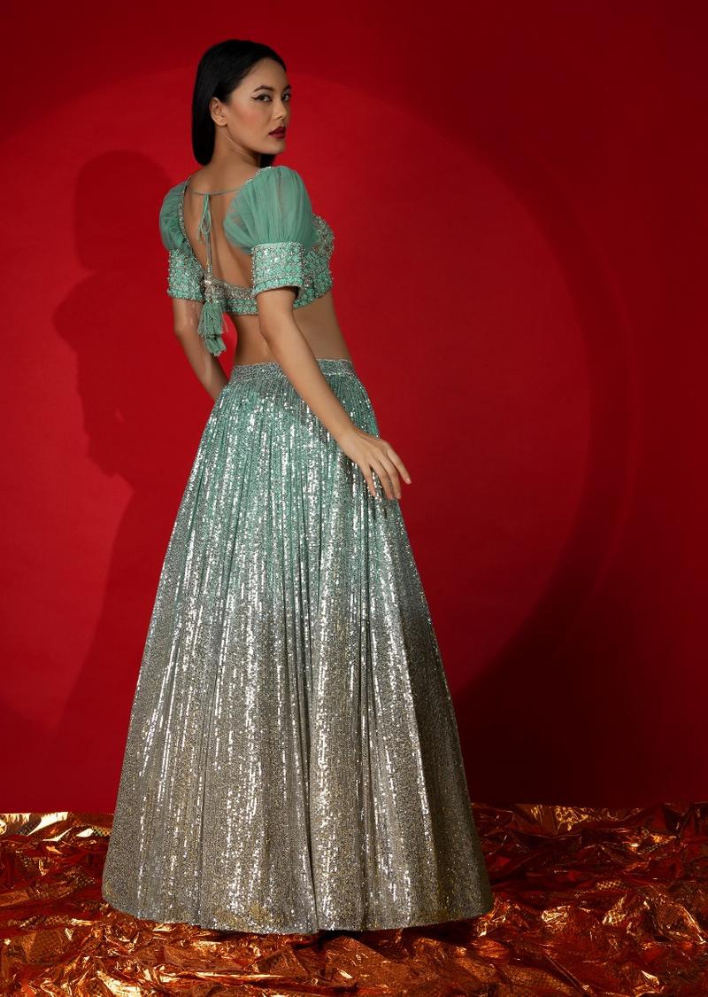 Aqua Green Ombre Sequins Lehenga With Hand Embroidered Choli Featuring Half Puffed Sleeves