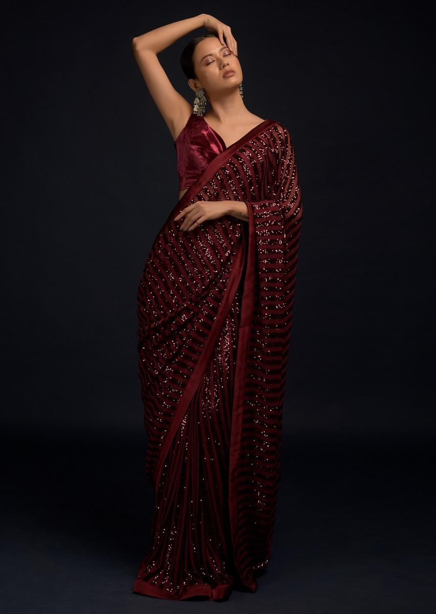 Kalki Fashion,M001RA448Y-SG59232,Burgundy Red Ready Pleated Saree In Net With Sequin Embellished Stripes And Matching Velvet Crop Top