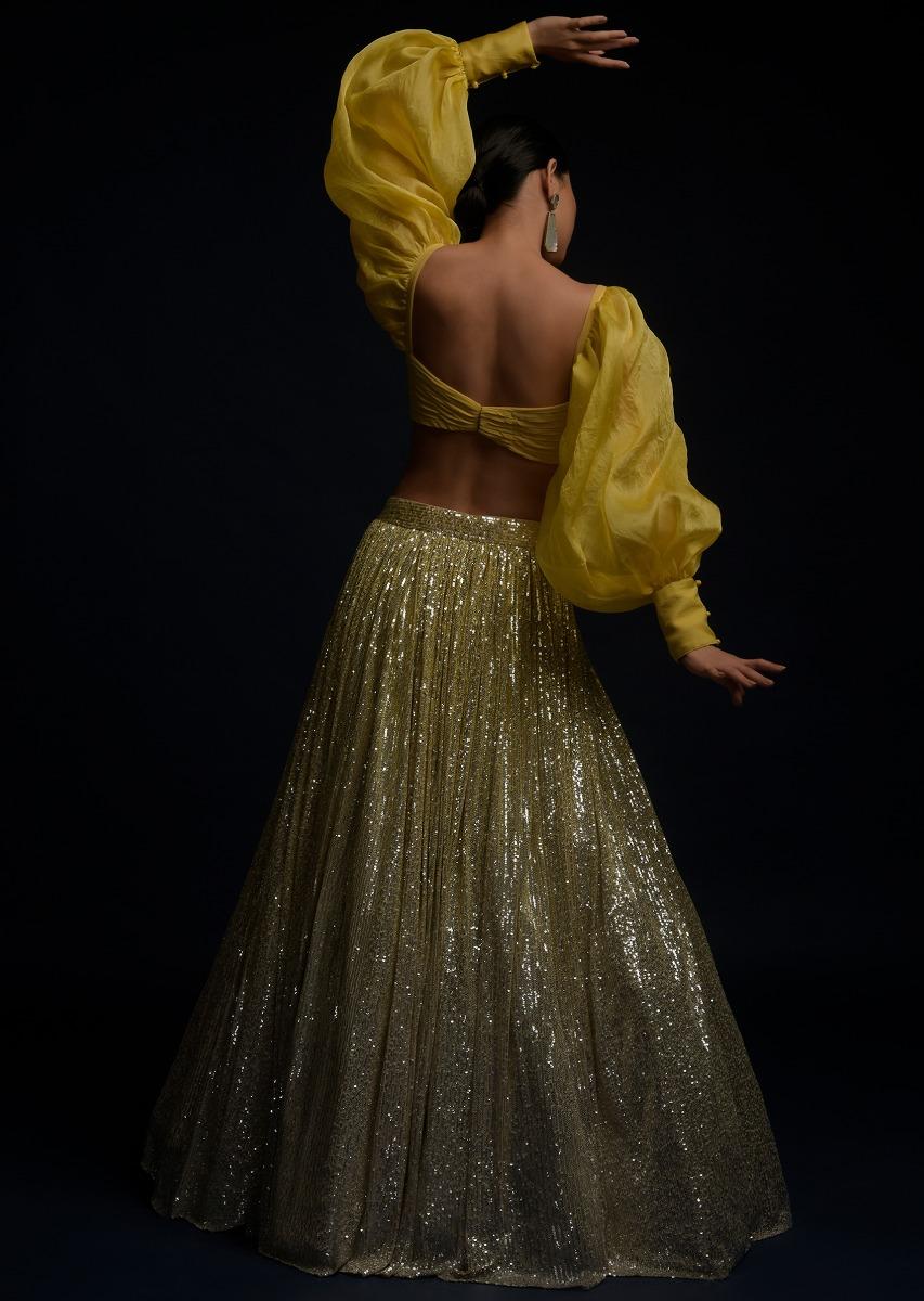 Kalki Fashion,M001TR335Y-SG59720,Yellow And Silver Ombre Lehenga Embellished In Sequins And Matching Organza Blouse With Fancy Puffed Sleeves