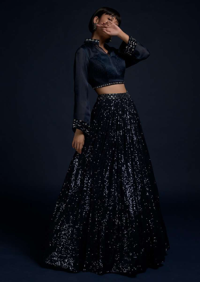 Navy Blue Lehenga Embellished In Sequins With A Matching Organza Crop Top Adorned With Cut Dana On The Underlayer