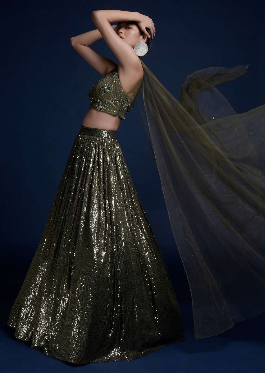 Olive Green Lehenga Embellished In Sequins And Cut Dana Embellished Crop Top With Attached Net Cape