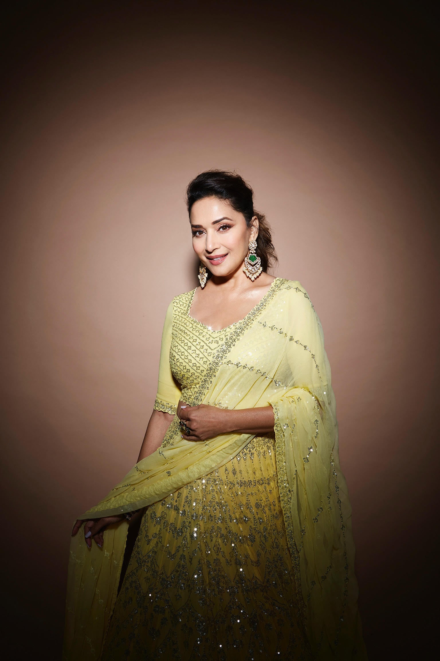 Madhuri Dixit In Yellow Multi-Tiered Lehenga Set