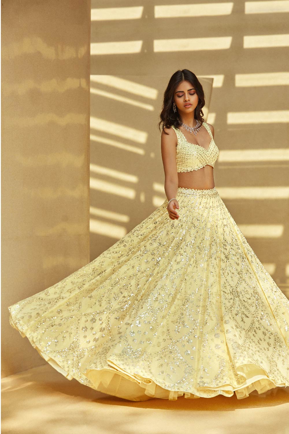 Madhuri Dixit In Yellow Multi-Tiered Lehenga Set