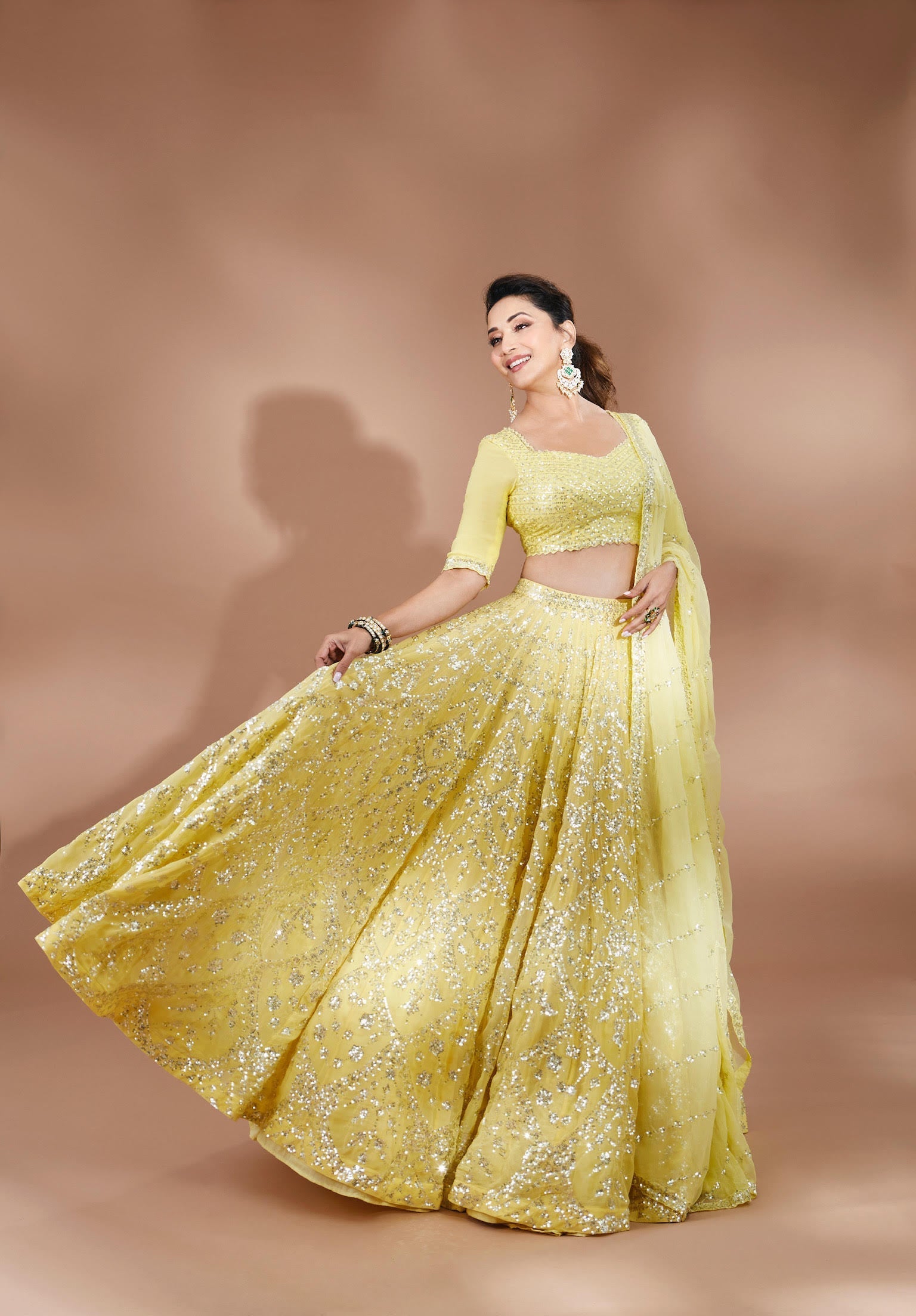 Madhuri Dixit In Yellow Multi-Tiered Lehenga Set