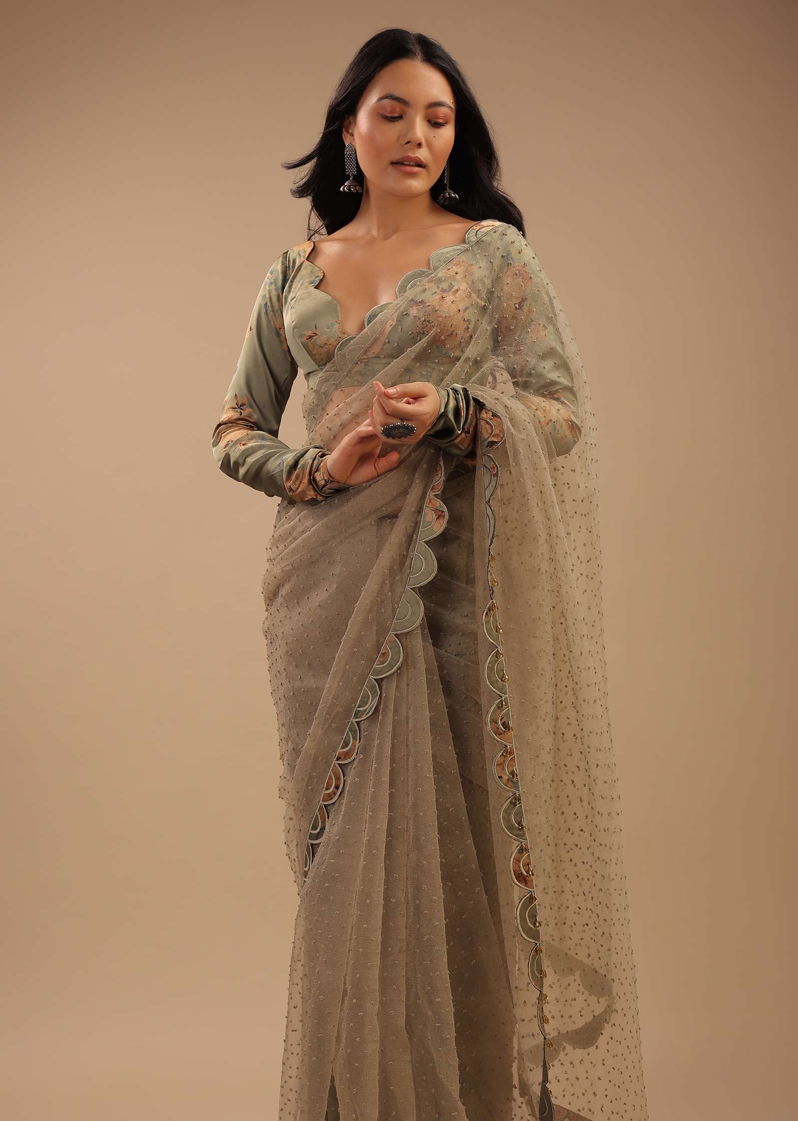 Tea Green Organza Saree With Self Buttis And A Floral Printed Satin Blouse