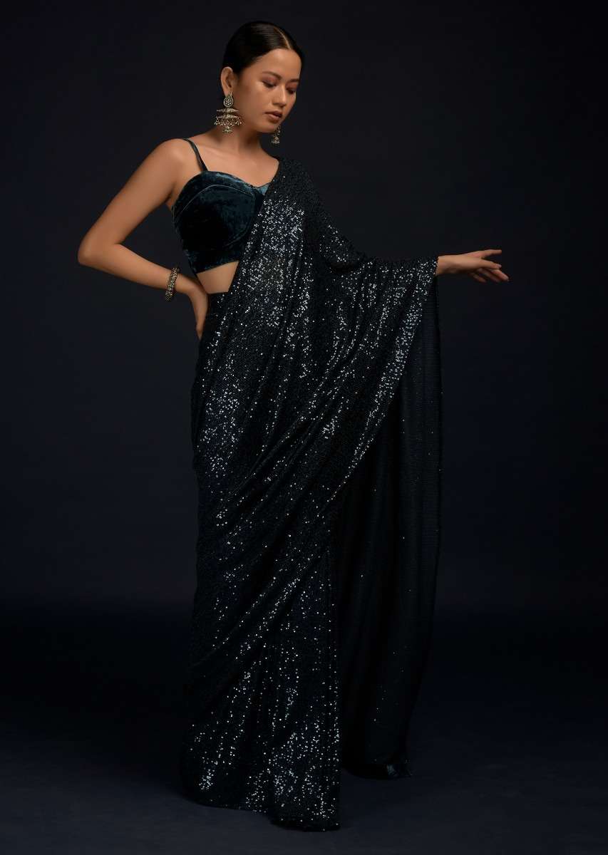 Teal Blue Ready Pleated Saree Embellished In Sequins With A Matching Velvet Blouse With Corset Neckline