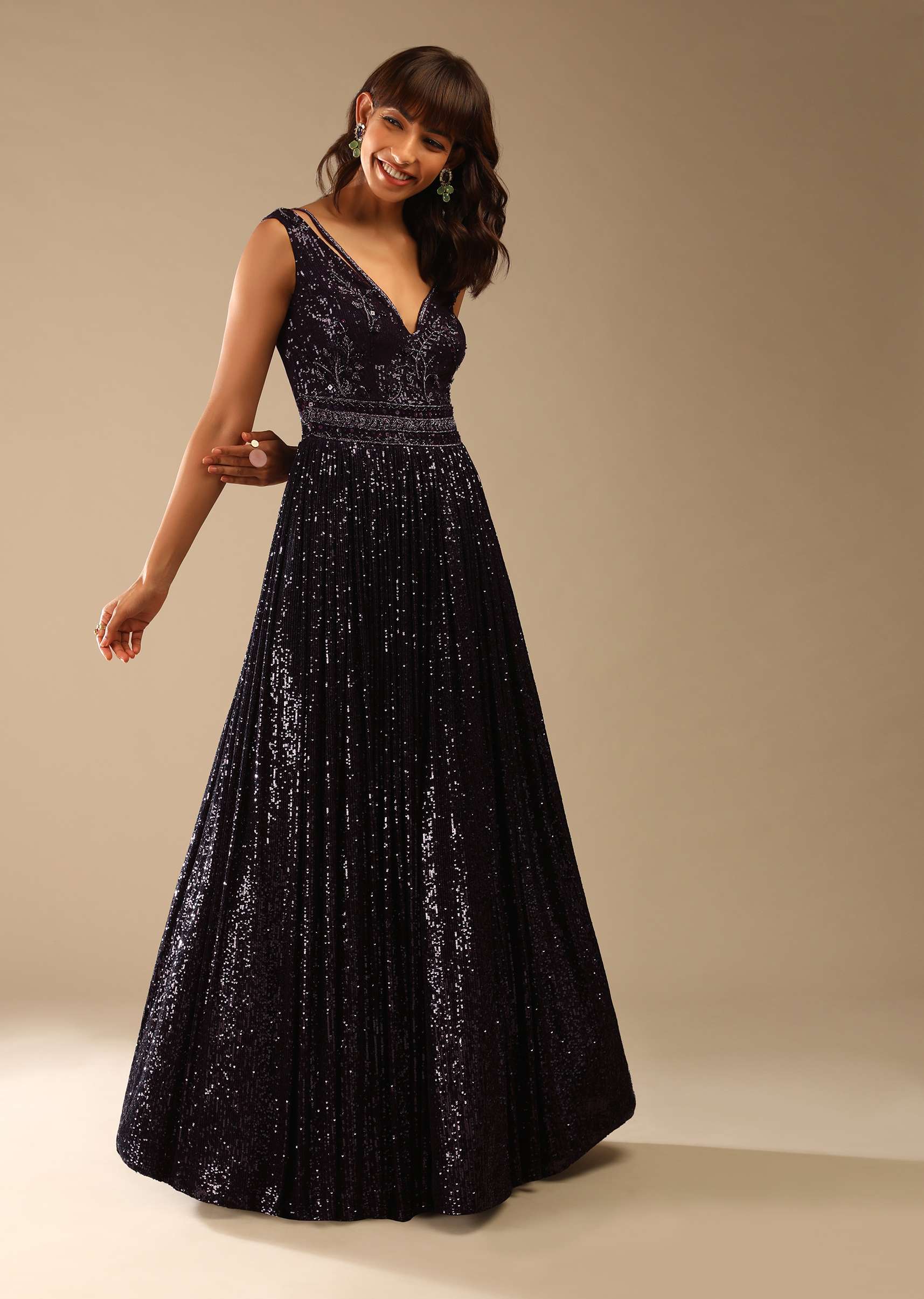 Wine Purple Gown Embellished In Sequins With Cut Dana Work And Deep V Neckline